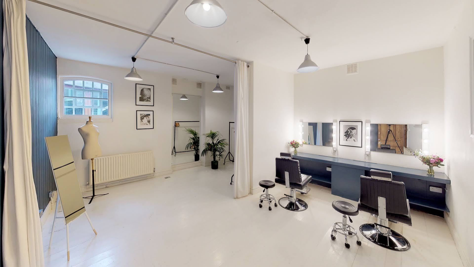 Versatile Park Village venue with makeup station, ideal for beauty workshops and events.