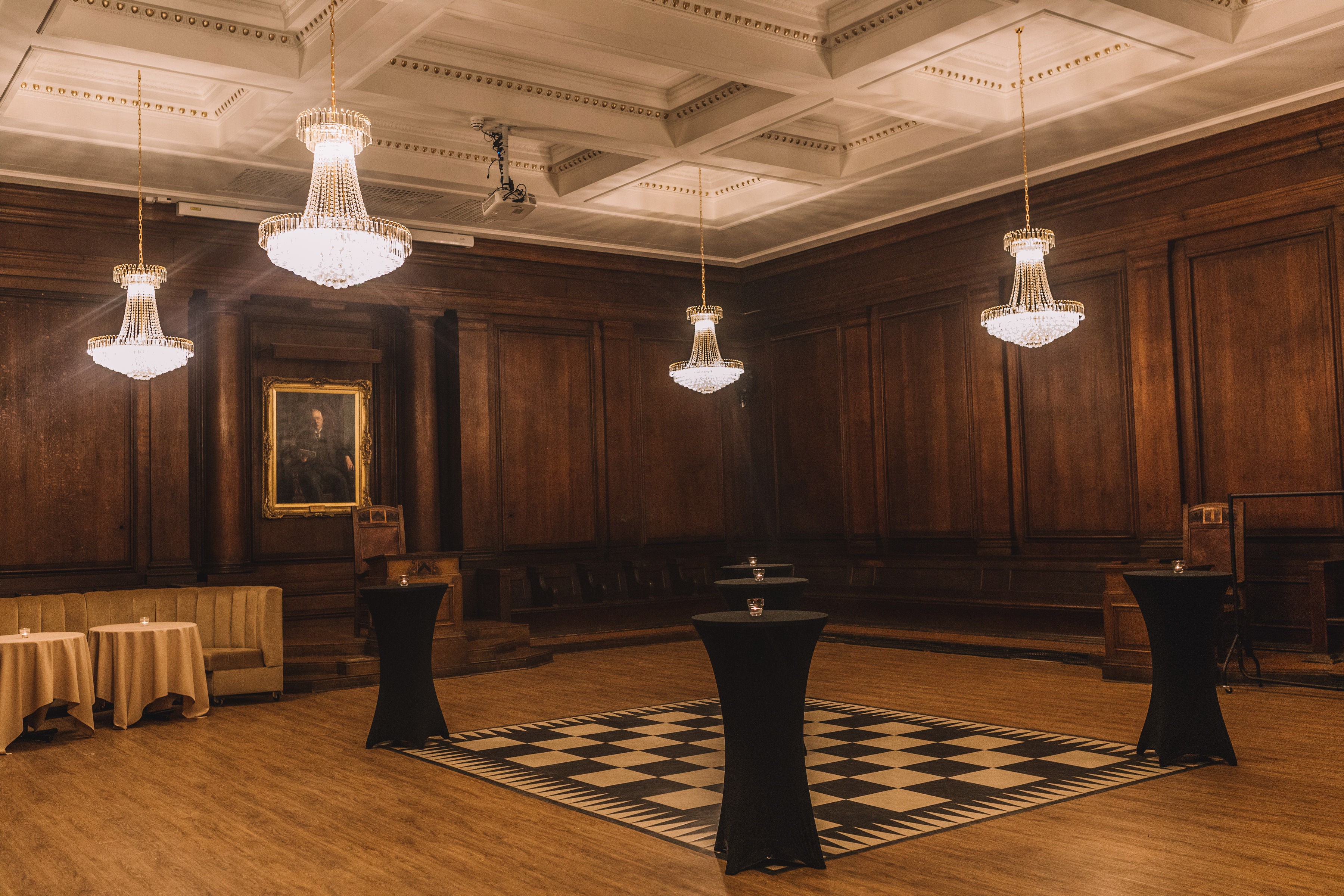 Elegant Goulburn Lodge event space with chandeliers, ideal for corporate gatherings.