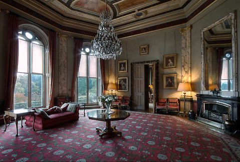 Elegant event space at Eastnor Castle with chandelier, ideal for meetings and retreats.