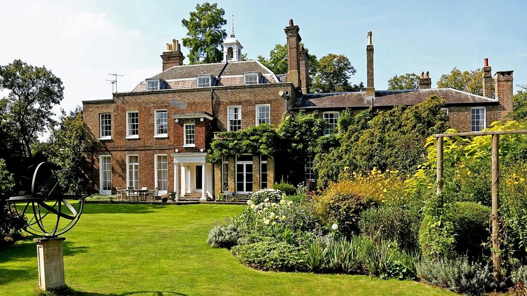 Lutyens' Room at Bell House: elegant venue with landscaped garden for outdoor events.