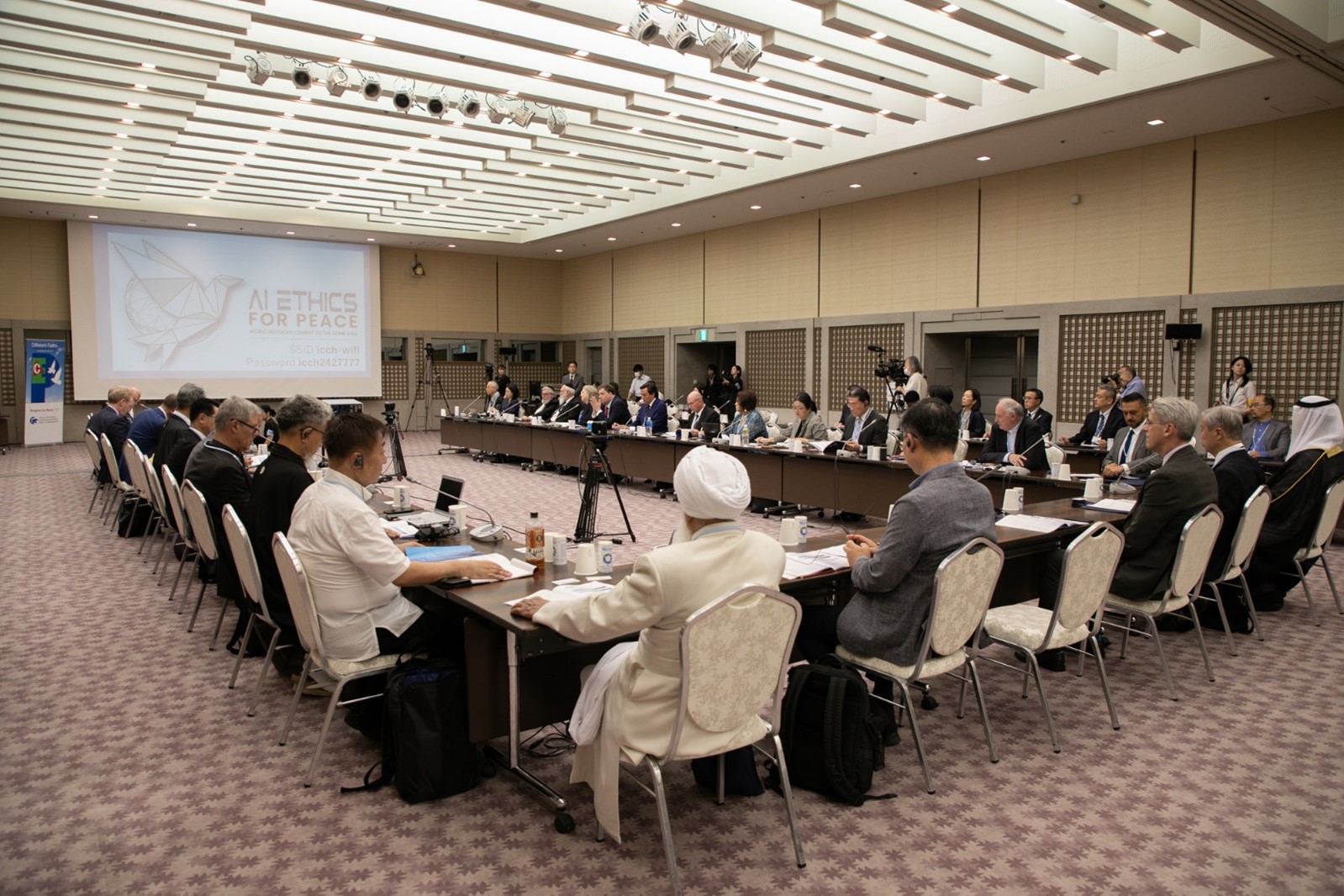 Conference Hall in Nishkam Centre with long table setup for professional meetings and discussions.