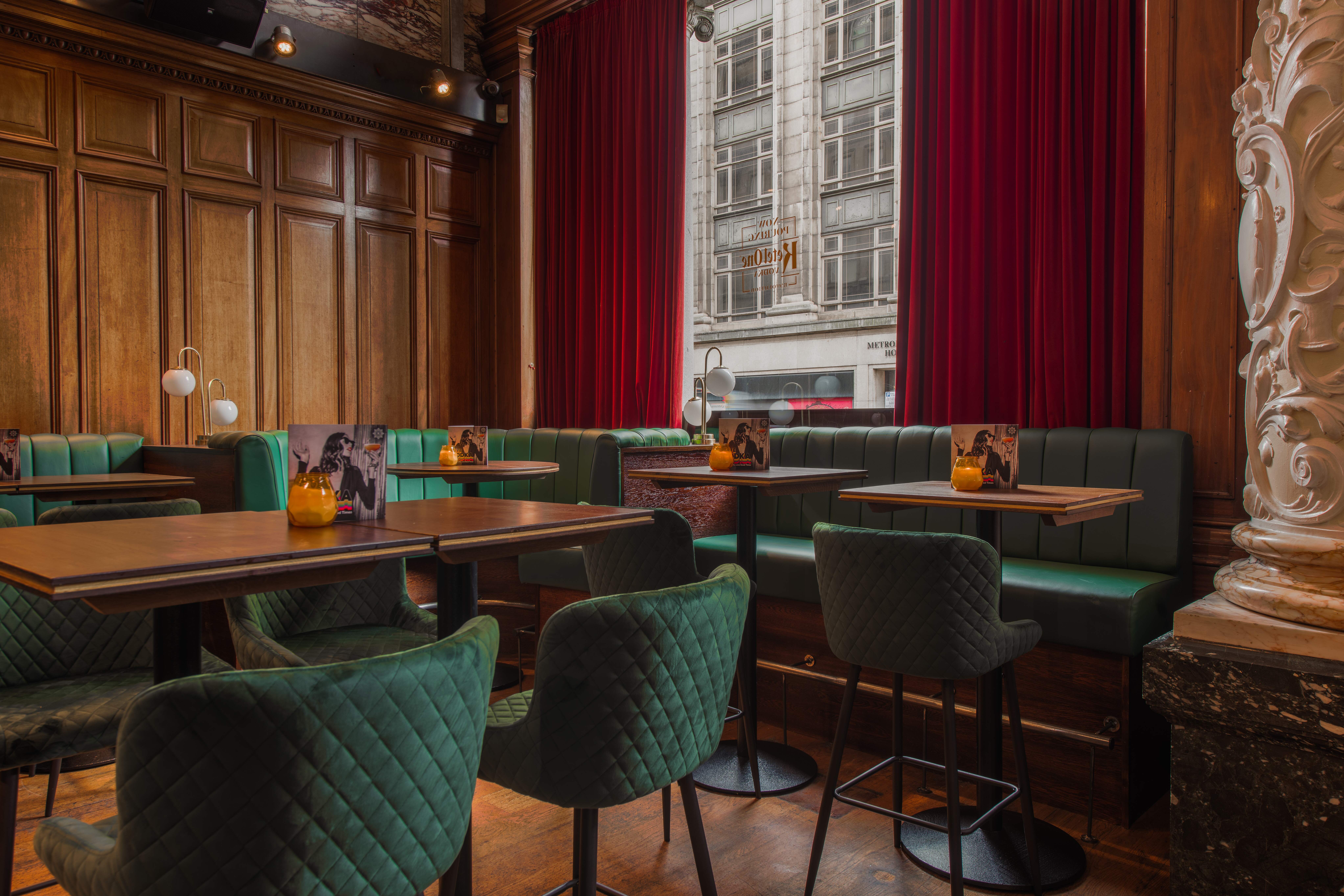 Stylish event space with plush seating in Revolution Newcastle for intimate gatherings.