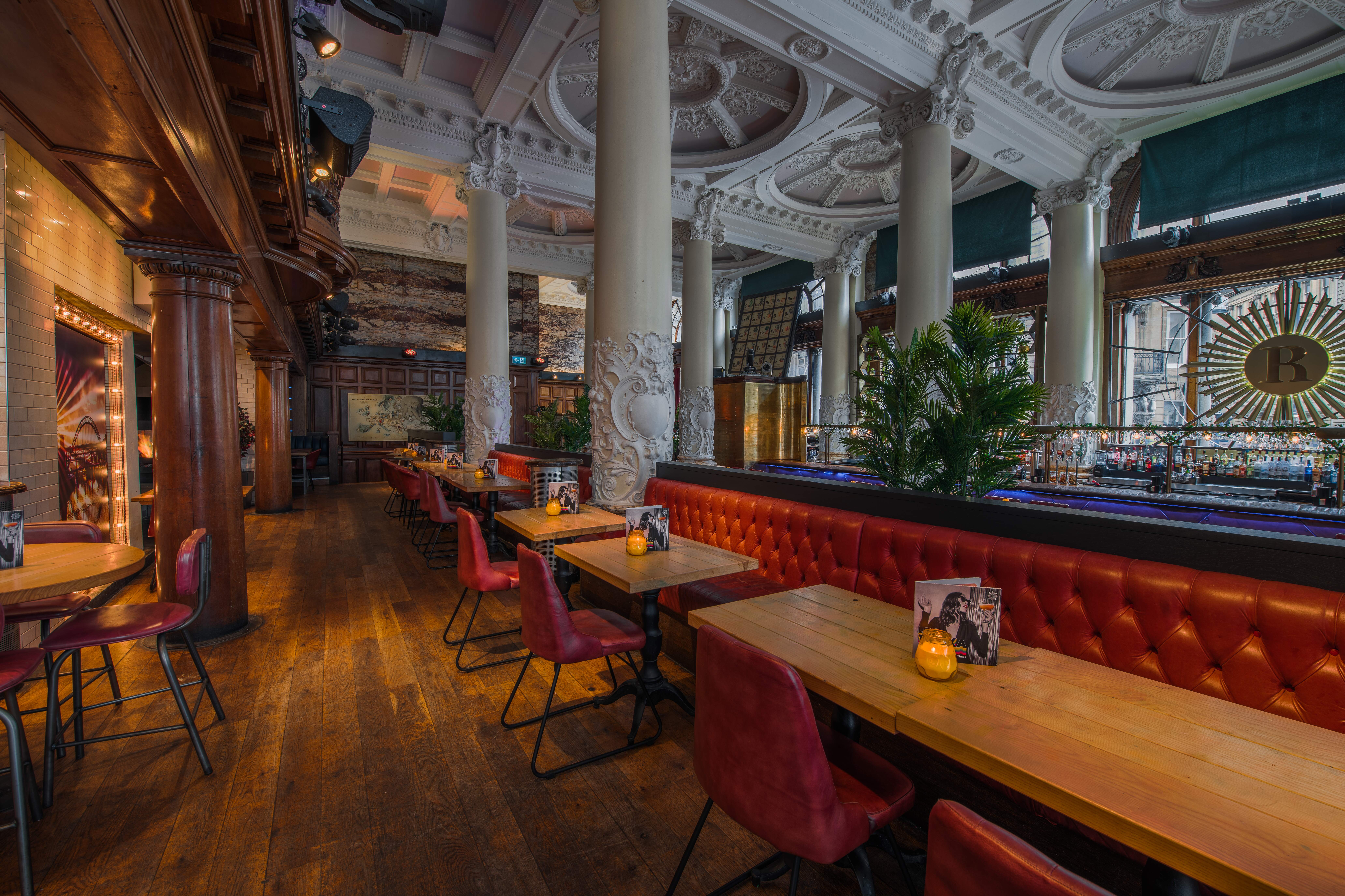 Stylish venue with elegant columns and plush seating for networking events in Newcastle.