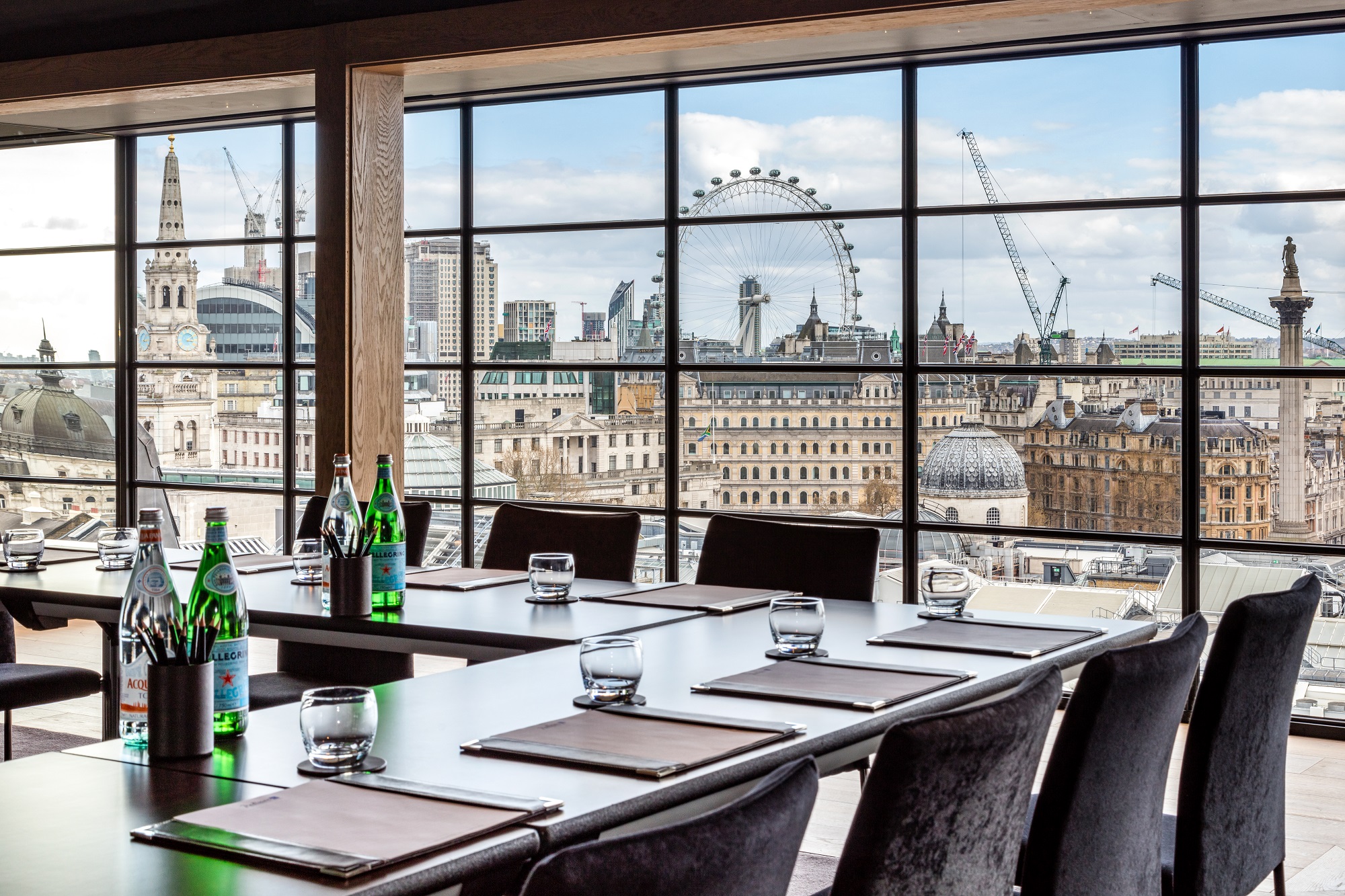 Penthouse Suite meeting room at Radisson Blu, London with cityscape view for corporate events.