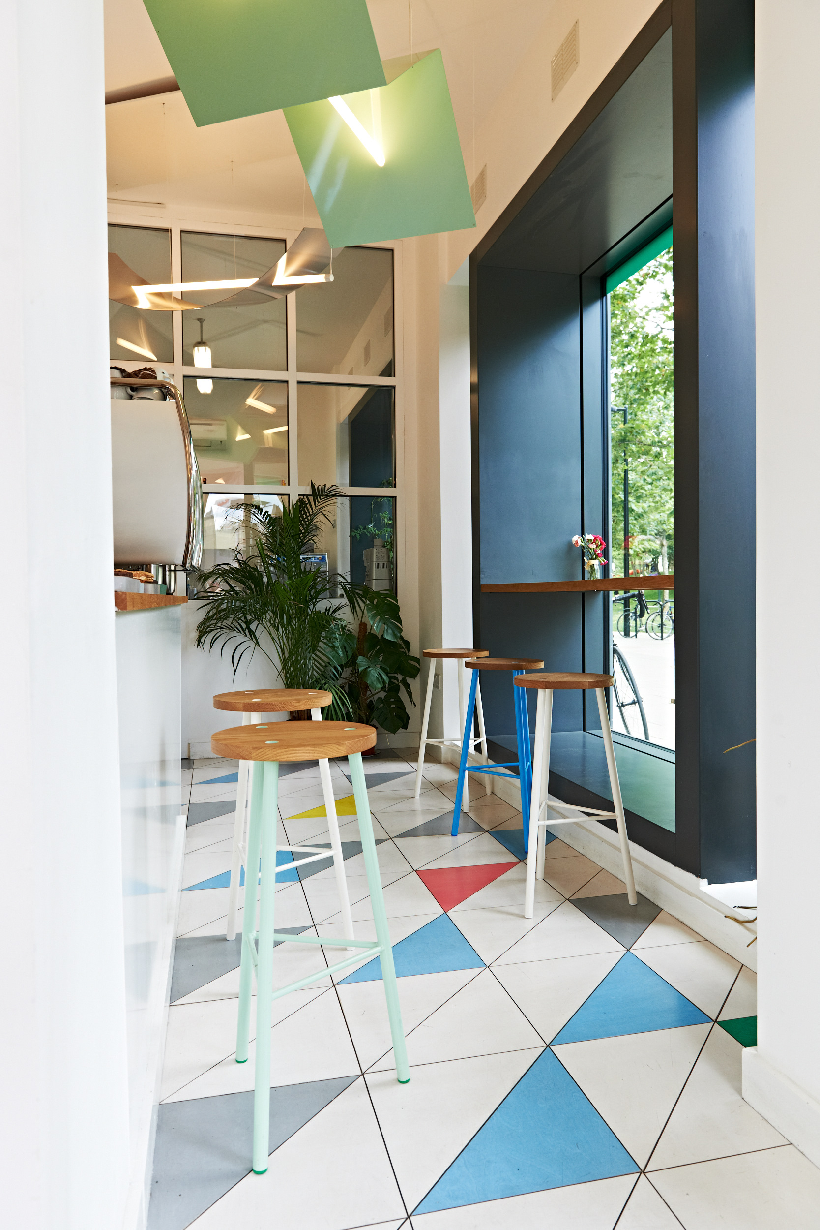 Modern gelato cafe with vibrant decor, ideal for casual meetings and networking events.