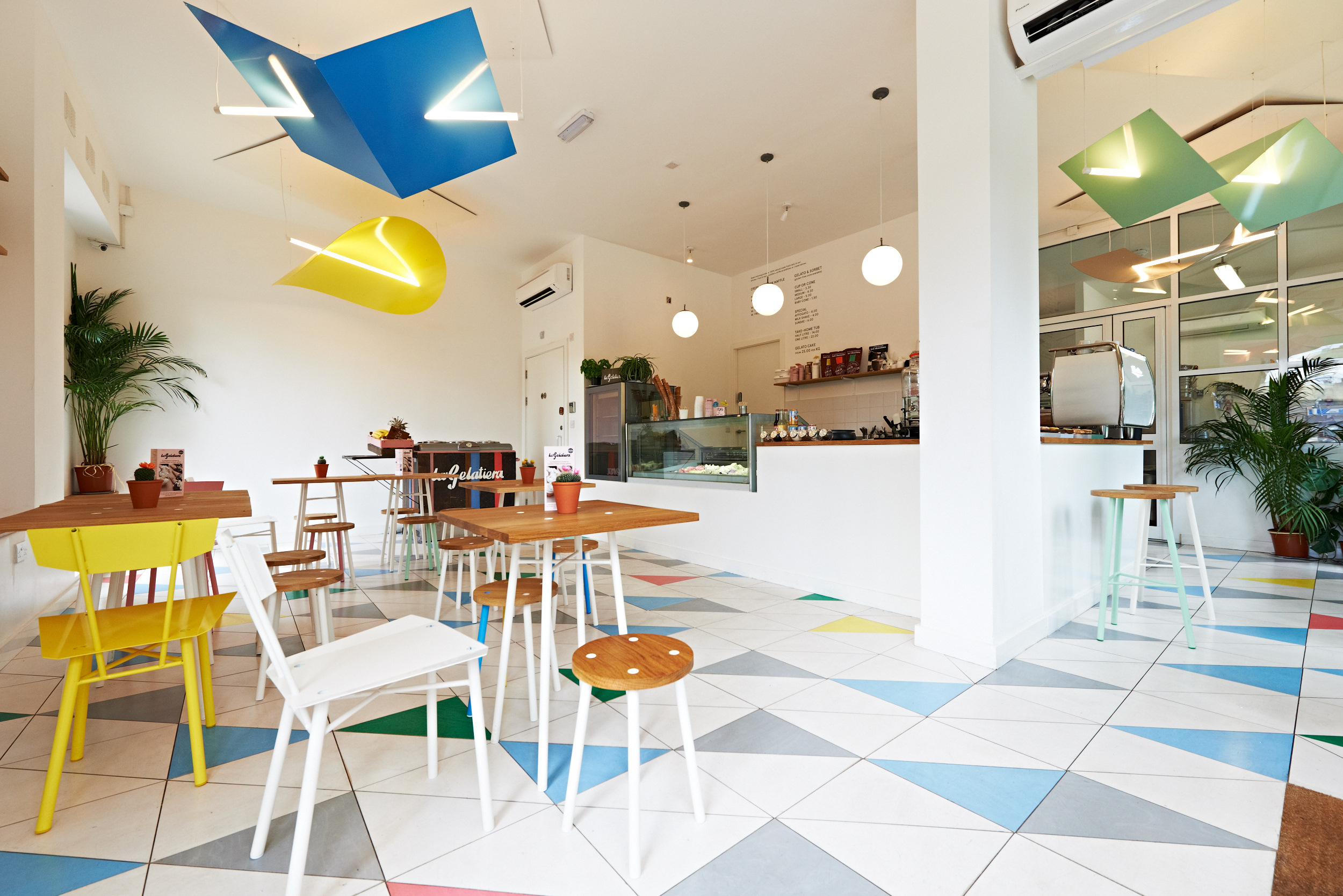 Vibrant gelato café with colorful decor, perfect for networking events and meetings.