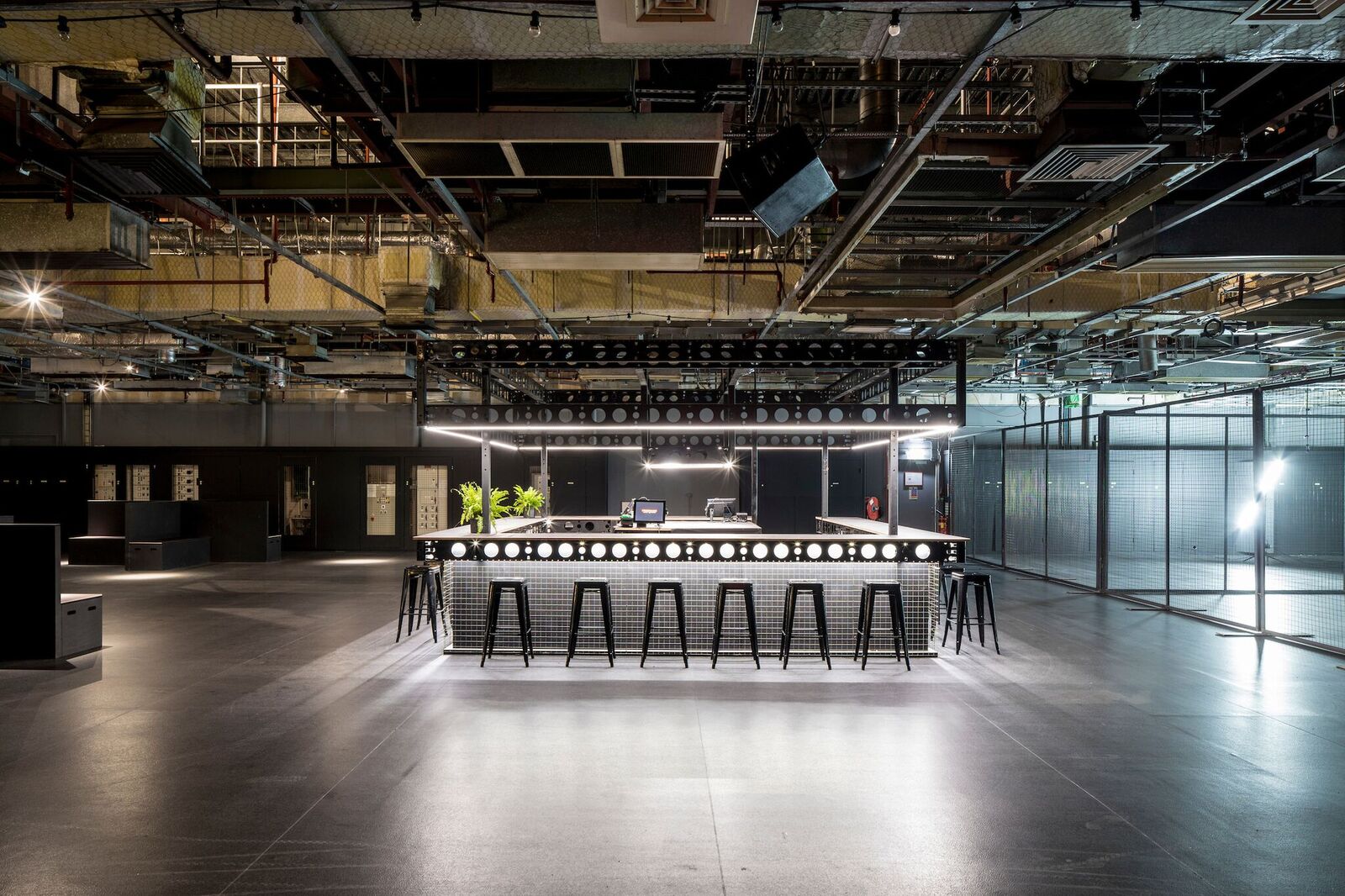 Modern Control Room at Printworks London with sleek bar, perfect for events and receptions.