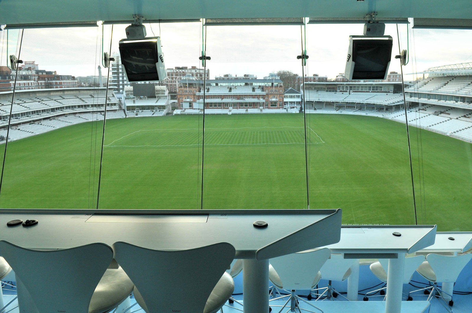 J.P. Morgan Media Centre at Lord's Cricket Ground, modern event space with green field view.