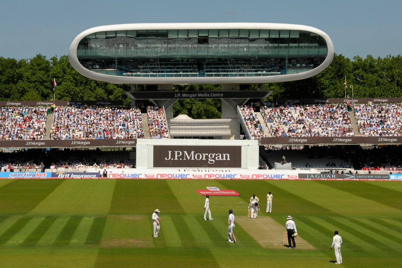 J.P. Morgan Media Centre at Lord's Cricket Ground during a vibrant cricket match event.