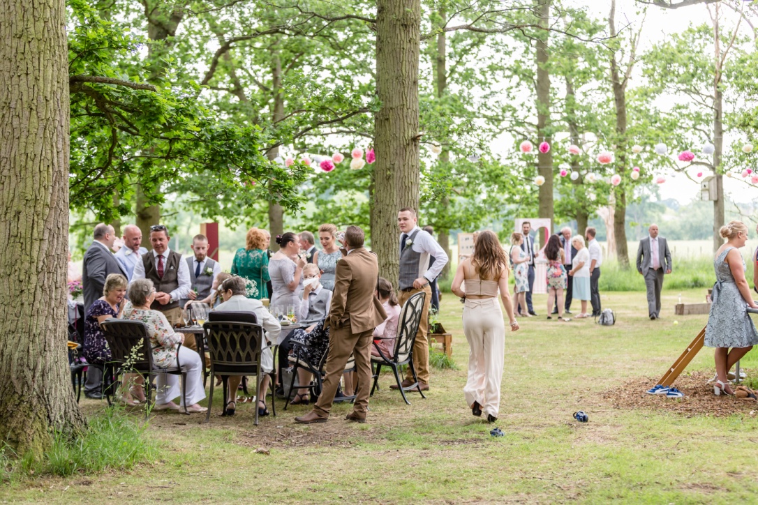 Outdoor wedding at Roundoak Farm with elegant seating and lush greenery.
