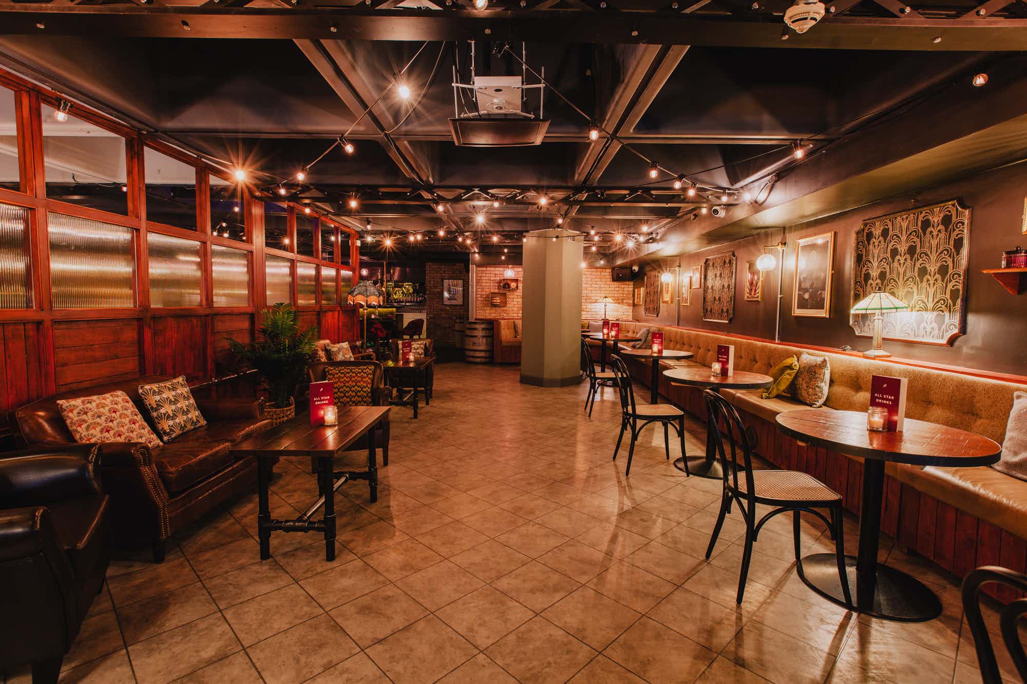 Cozy event space at All Star Lanes, perfect for gatherings and networking.