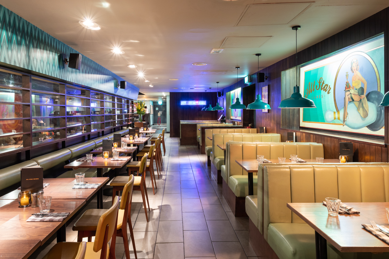 Modern restaurant venue with booth seating for intimate meetings and events in Holborn.