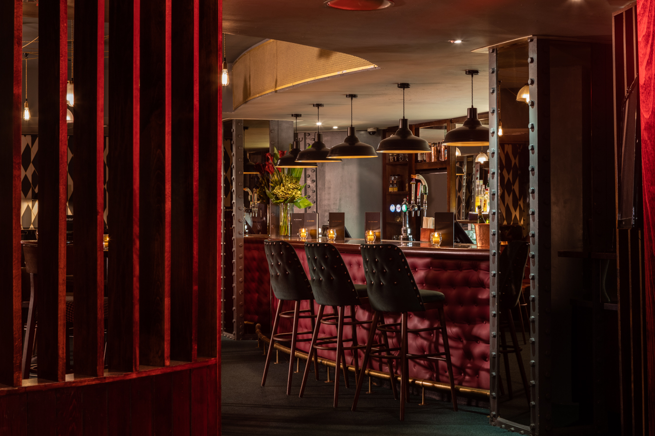 Stylish bar area at All Star Lanes Holborn for networking events and gatherings.