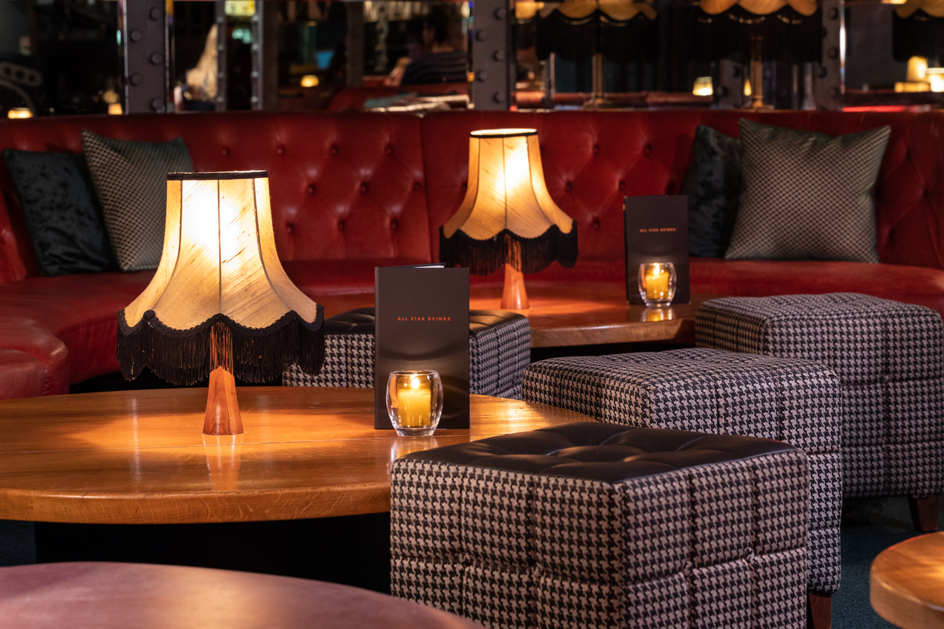 Stylish lounge at All Star Lanes Holborn for intimate gatherings and networking events.