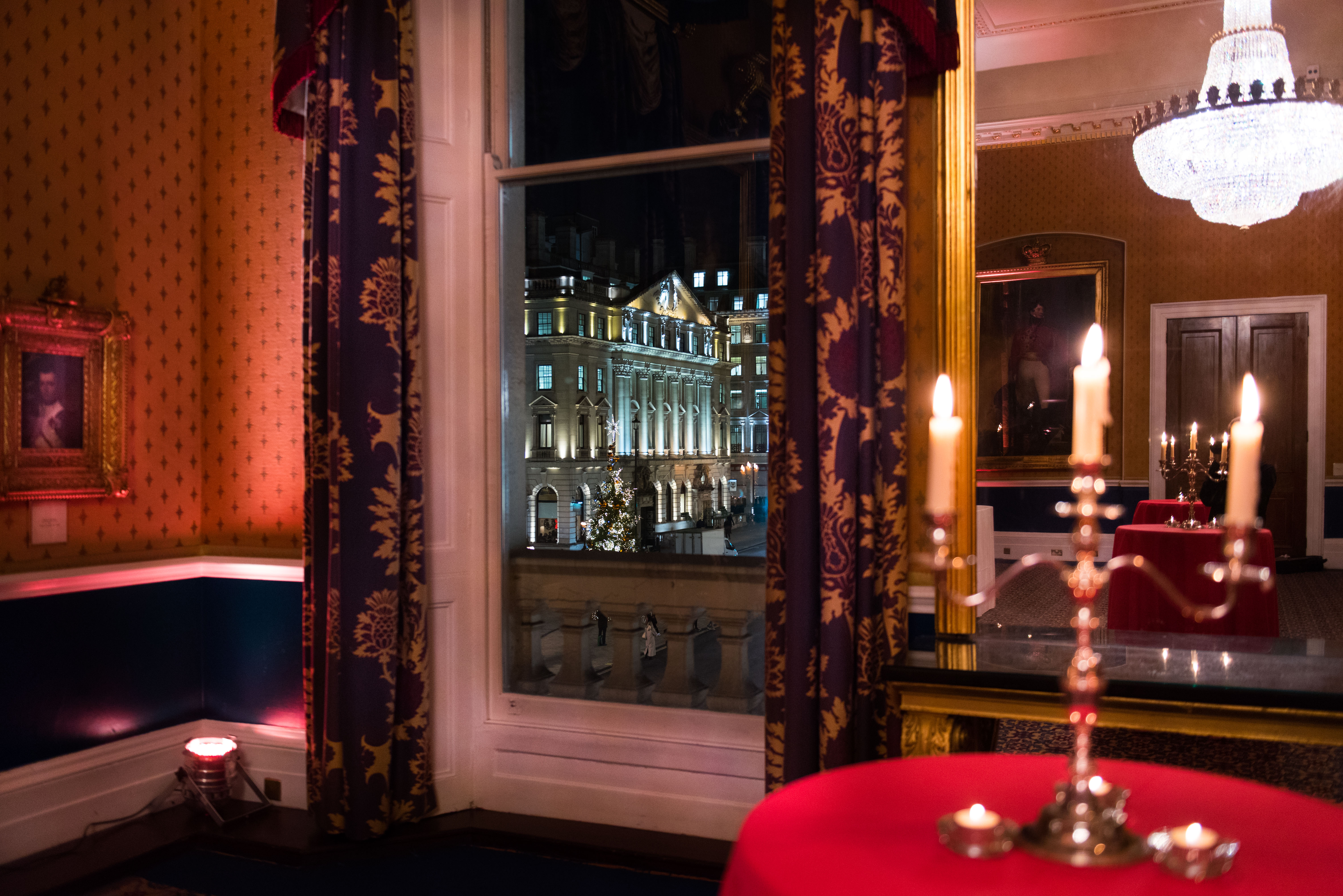 Elegant event space at Waterloo, featuring rich decor and candlelit ambiance for upscale gatherings.