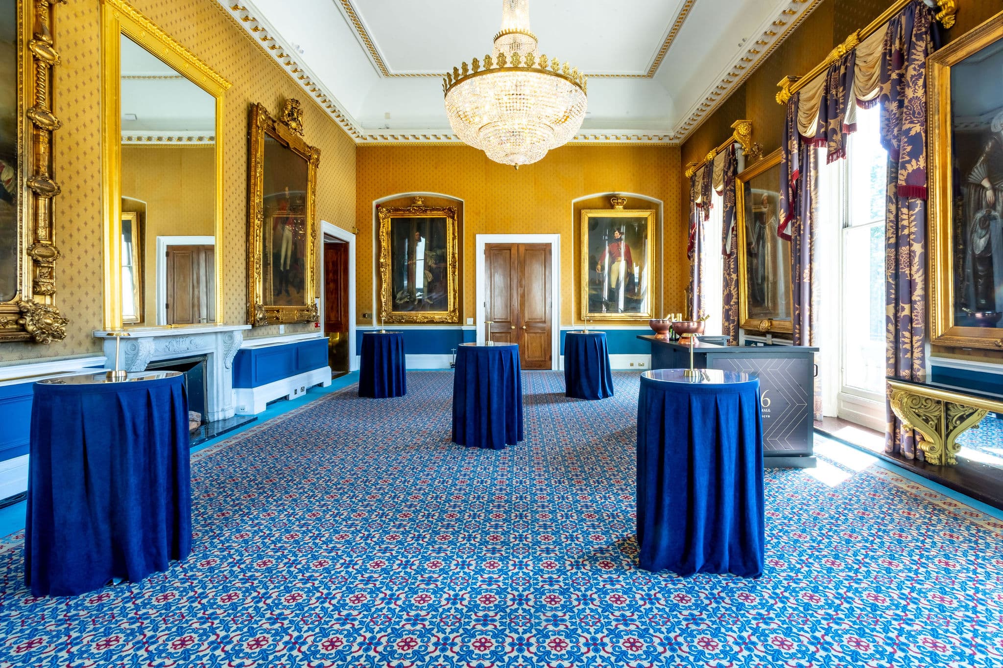 Waterloo at 116 Pall Mall: Sophisticated navy cocktail tables for corporate networking events.
