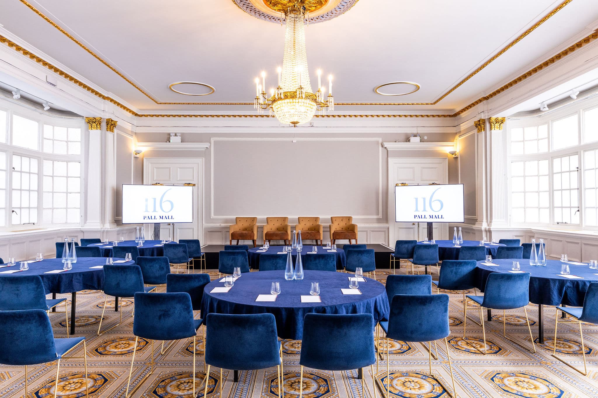 Burton ballroom, 116 Pall Mall with blue linens for corporate conference and event venue.