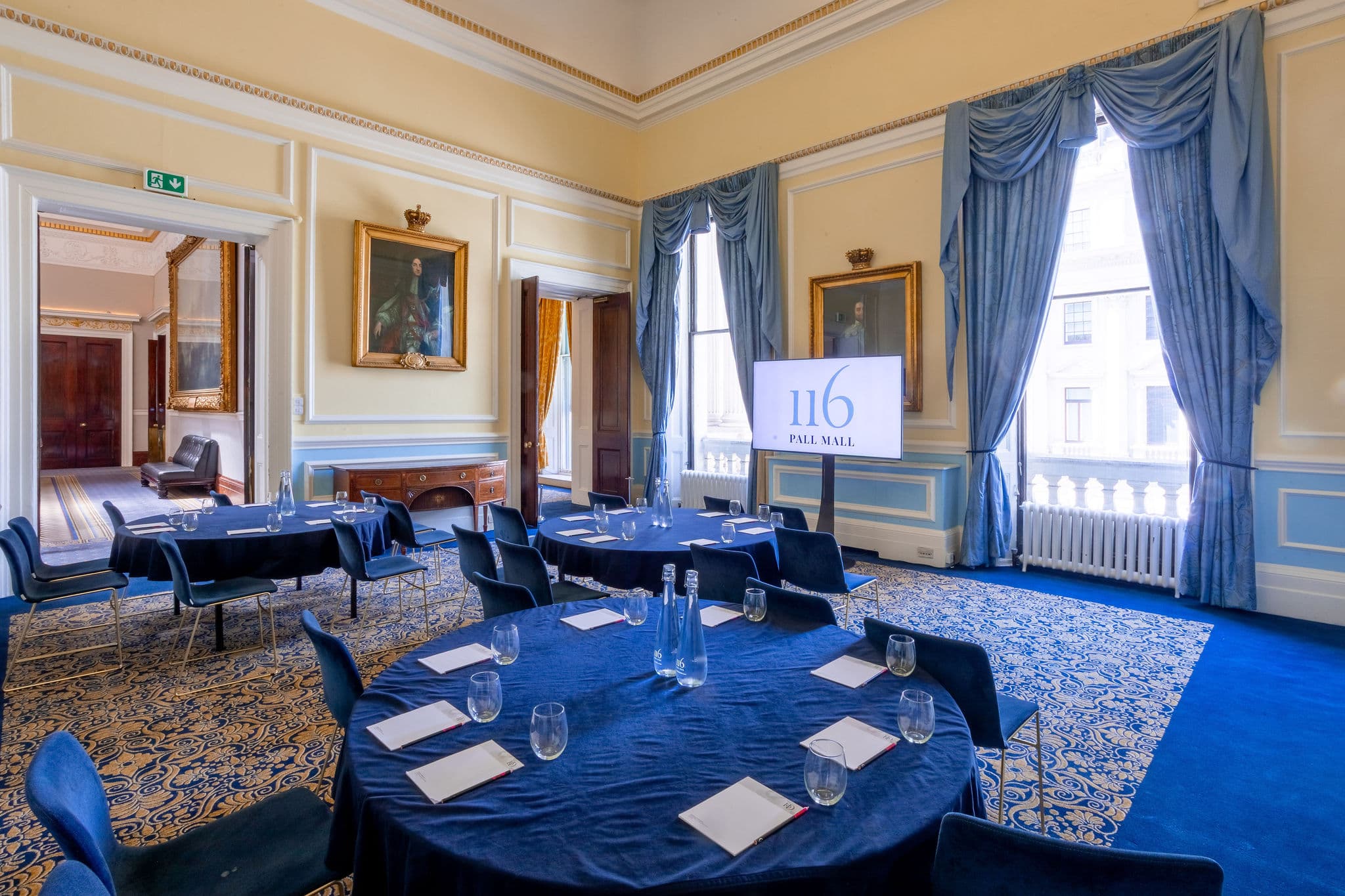 St James Rooms at 116 Pall Mall with round-table setup for corporate meetings and event hire.