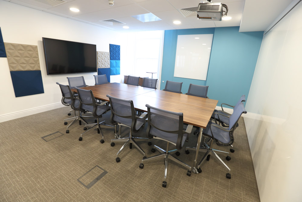 Modern conference room at IoD Academy, ideal for collaborative meetings and presentations.