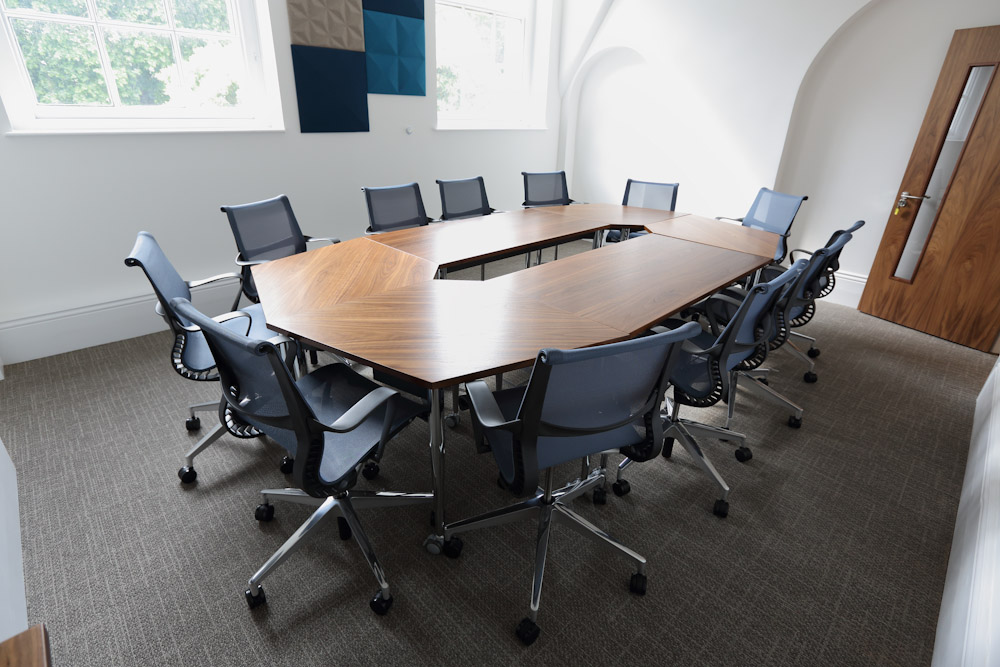 Modern meeting room at IoD Academy, ideal for corporate workshops and discussions.