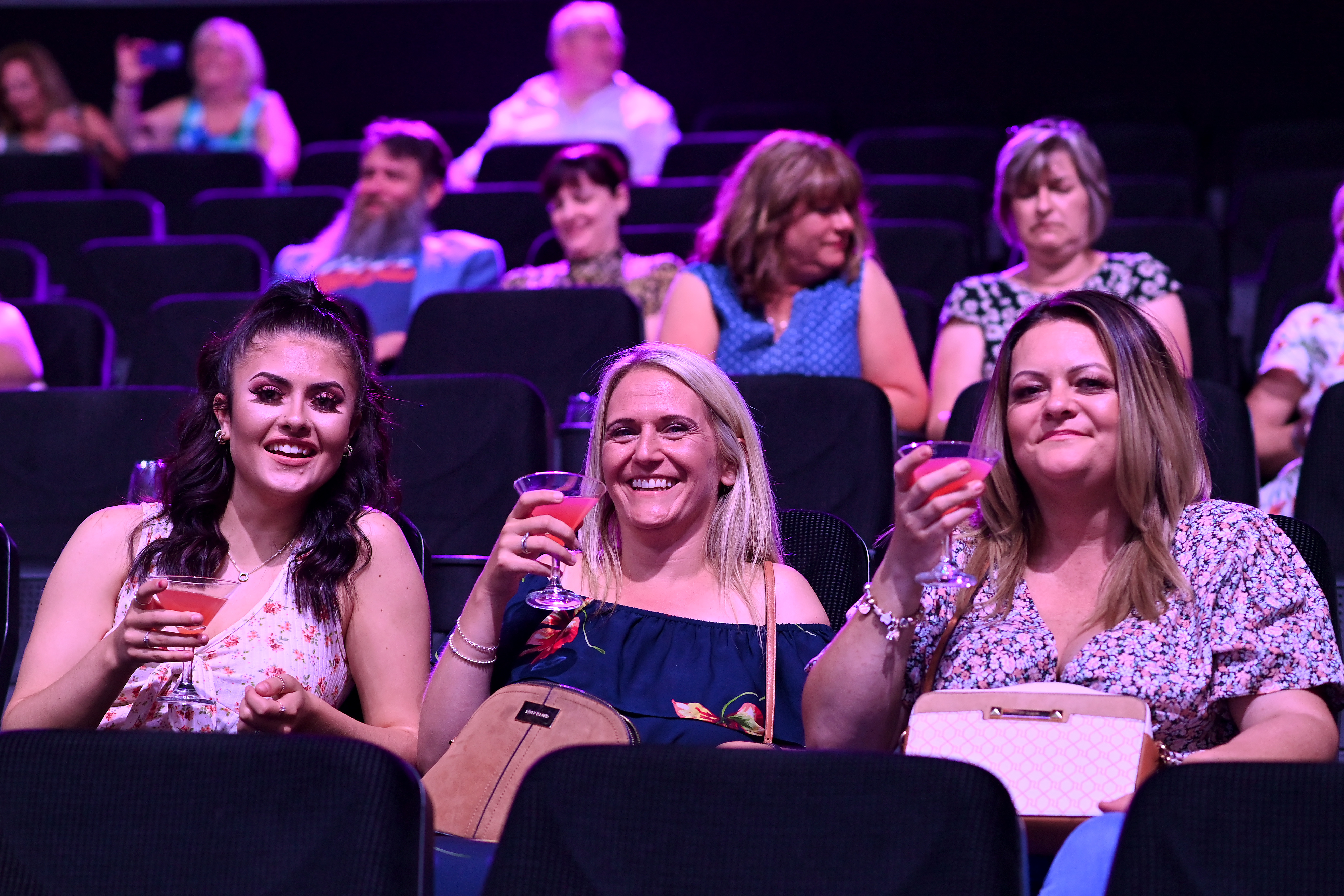 Engaged audience in Millennium Point auditorium at a lively networking event.