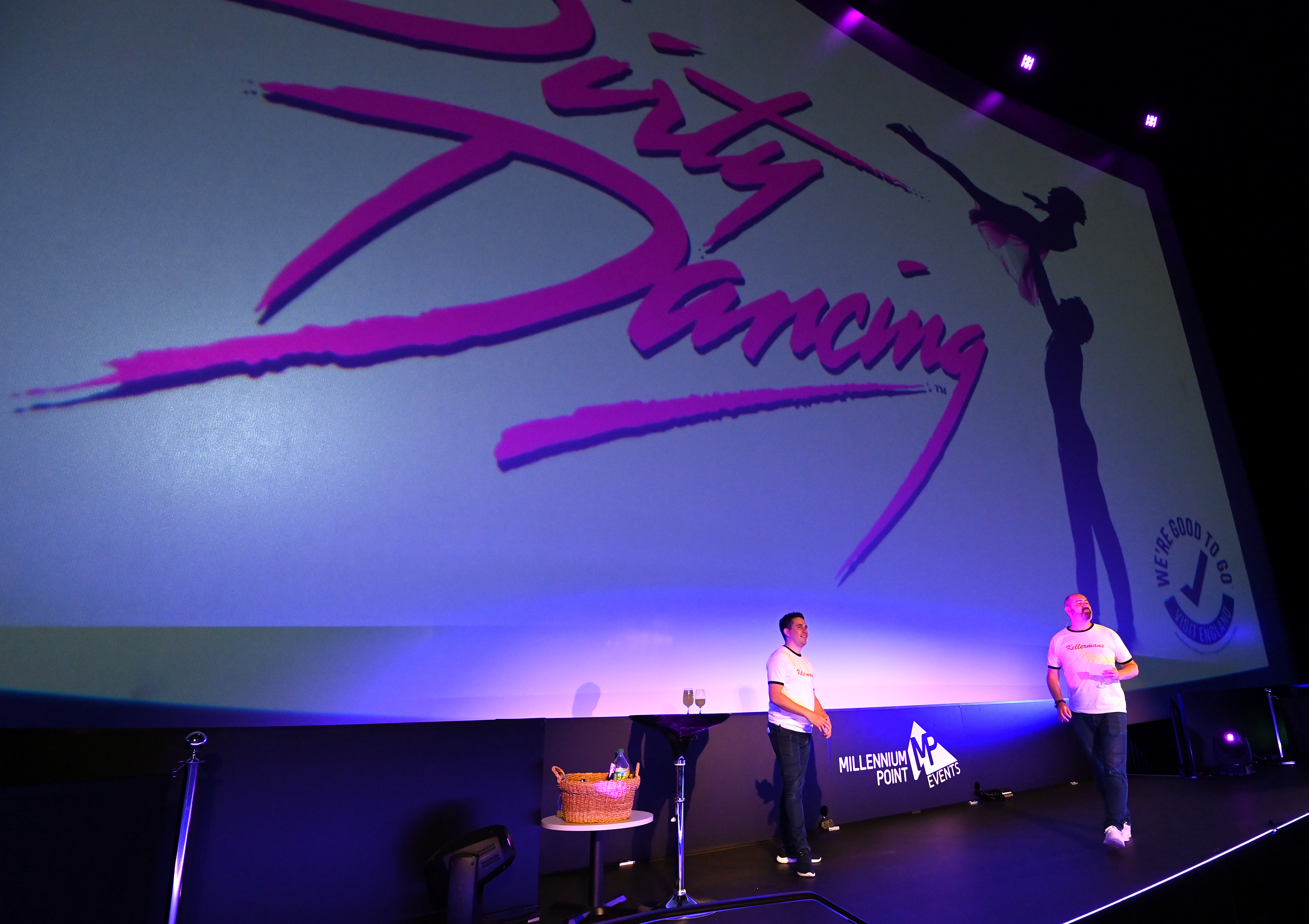 Auditorium event setup with "Dirty Dancing" logo for engaging themed presentation.