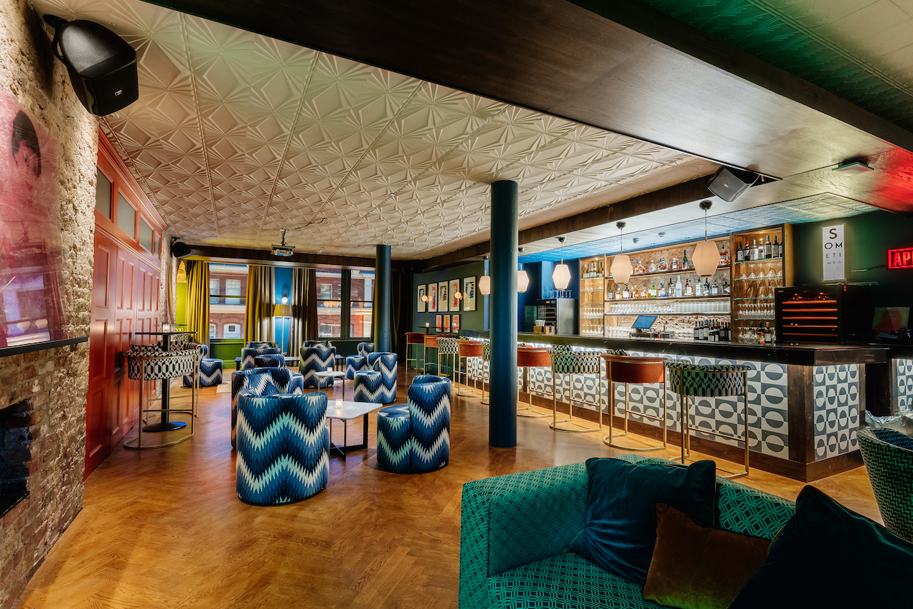 Stylish cocktail bar with eclectic decor, perfect for social events and meetings.