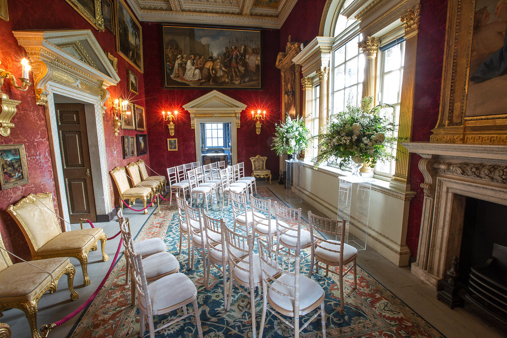 Chiswick House meeting space with red walls, ideal for upscale events and ceremonies.