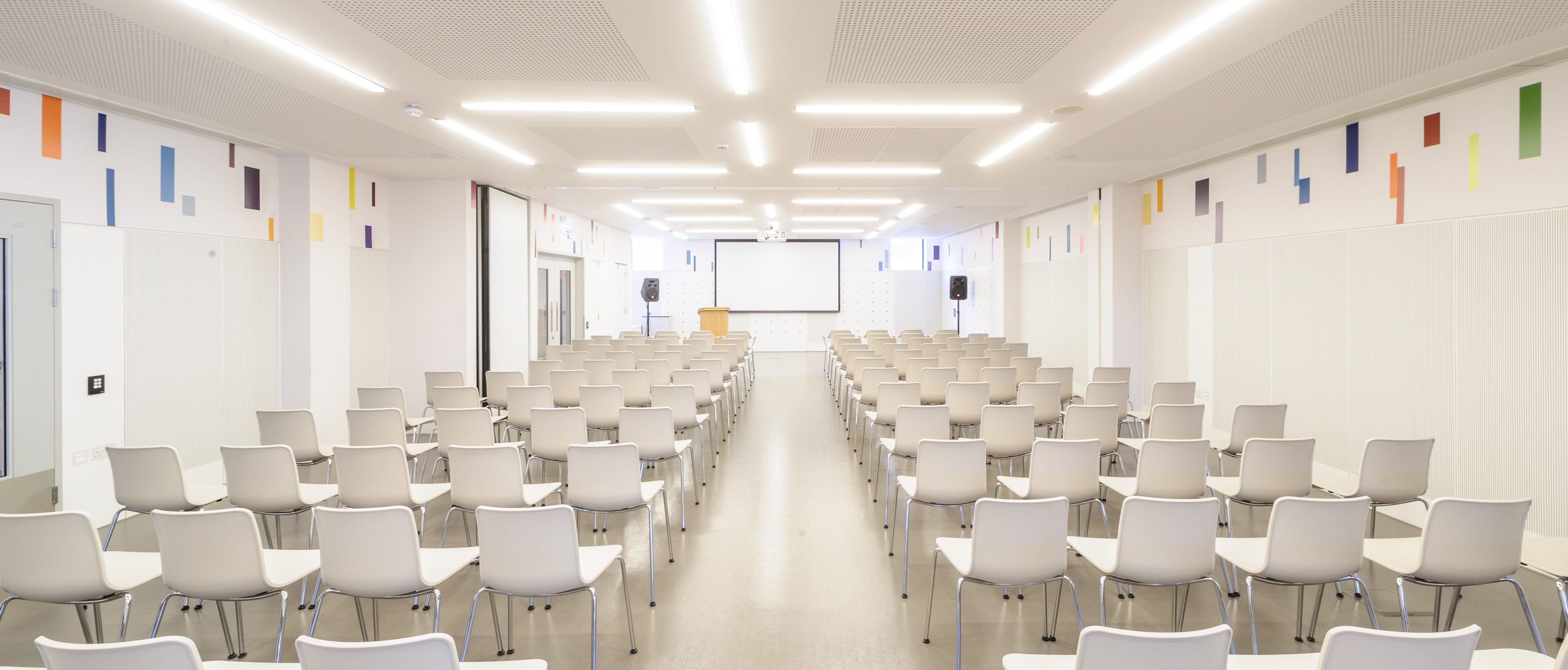 Foyle Centre event space with white chairs for a seminar in National Army Museum.