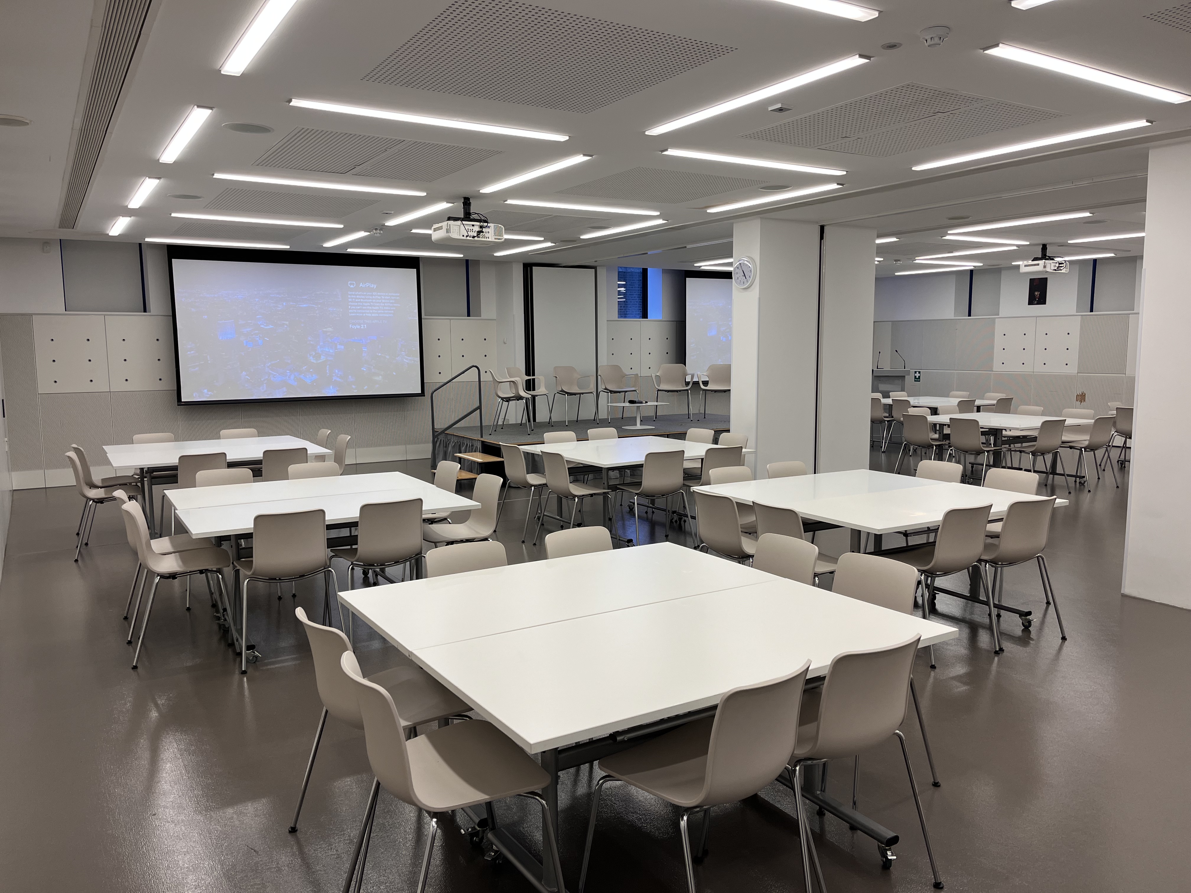 Foyle Centre meeting space with dual screens for workshops and networking at National Army Museum.