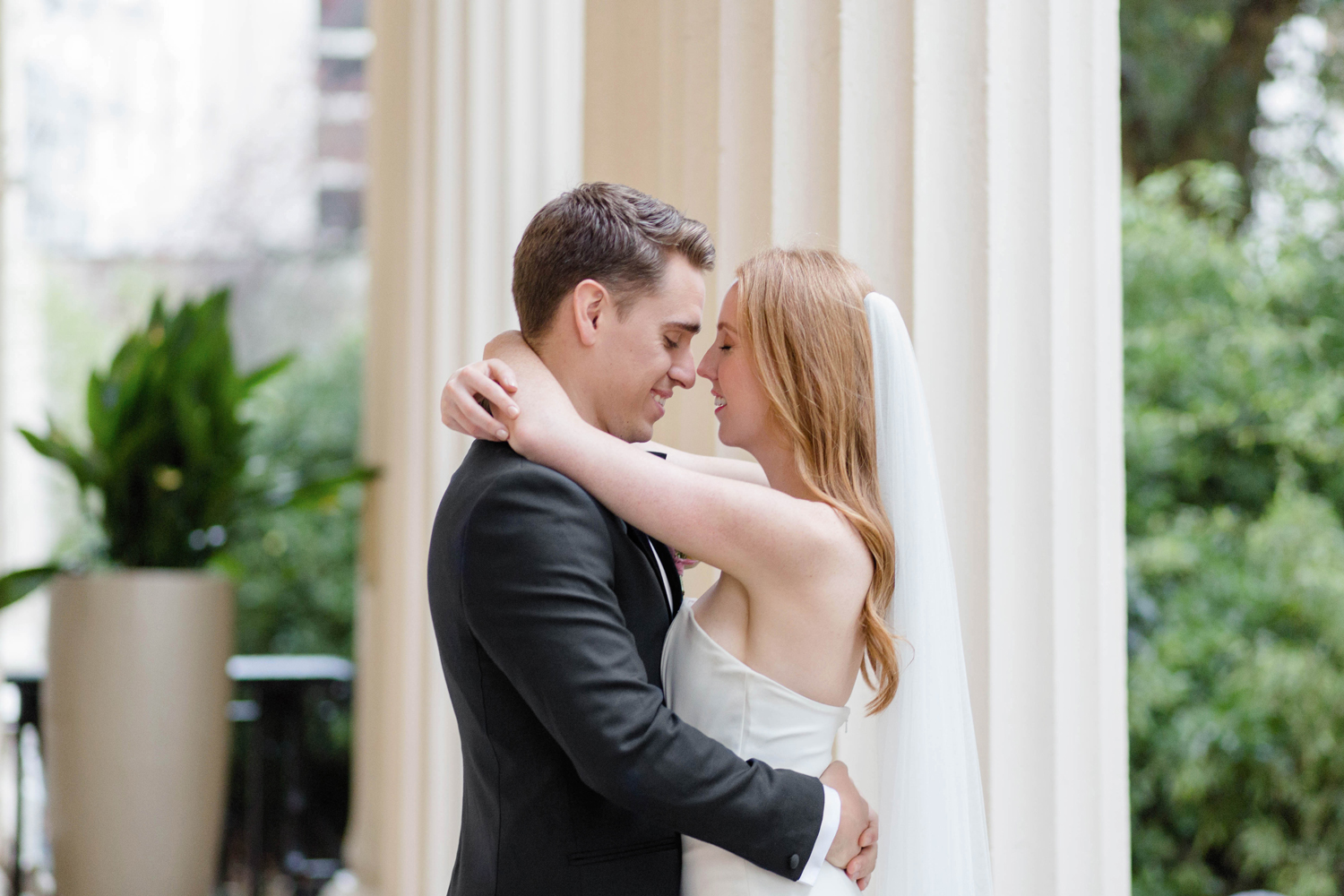 Couple embracing in Carlton Room, 116 Pall Mall, perfect for romantic weddings.