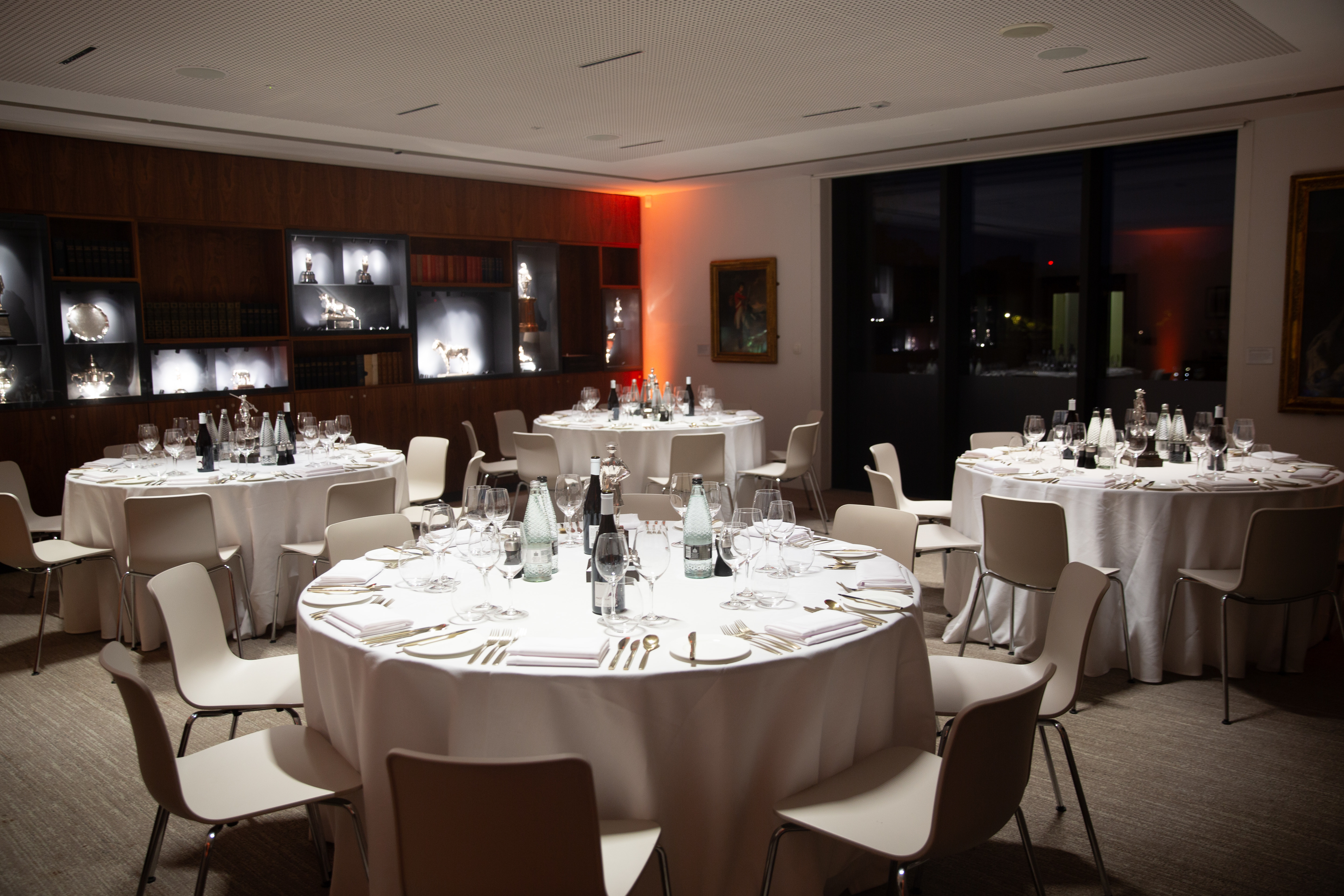 Elegant boardroom dining setup for corporate dinners and gala events.