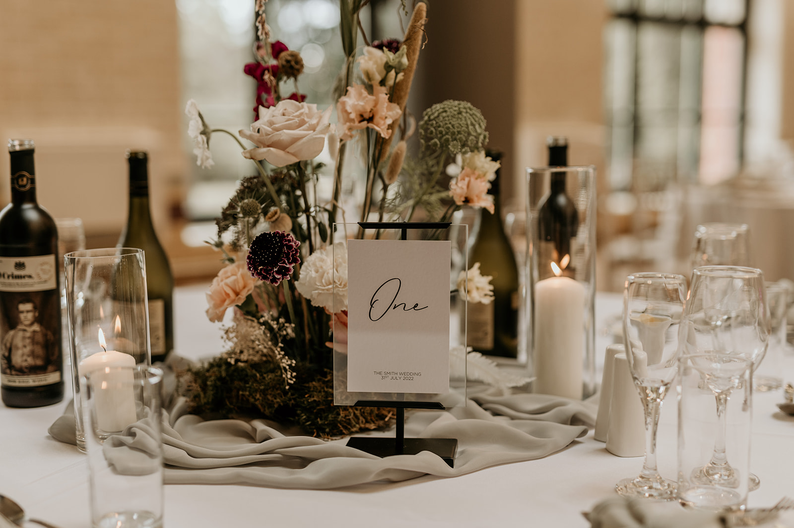 Elegant table setting with floral centerpiece for weddings at The Pumping House.