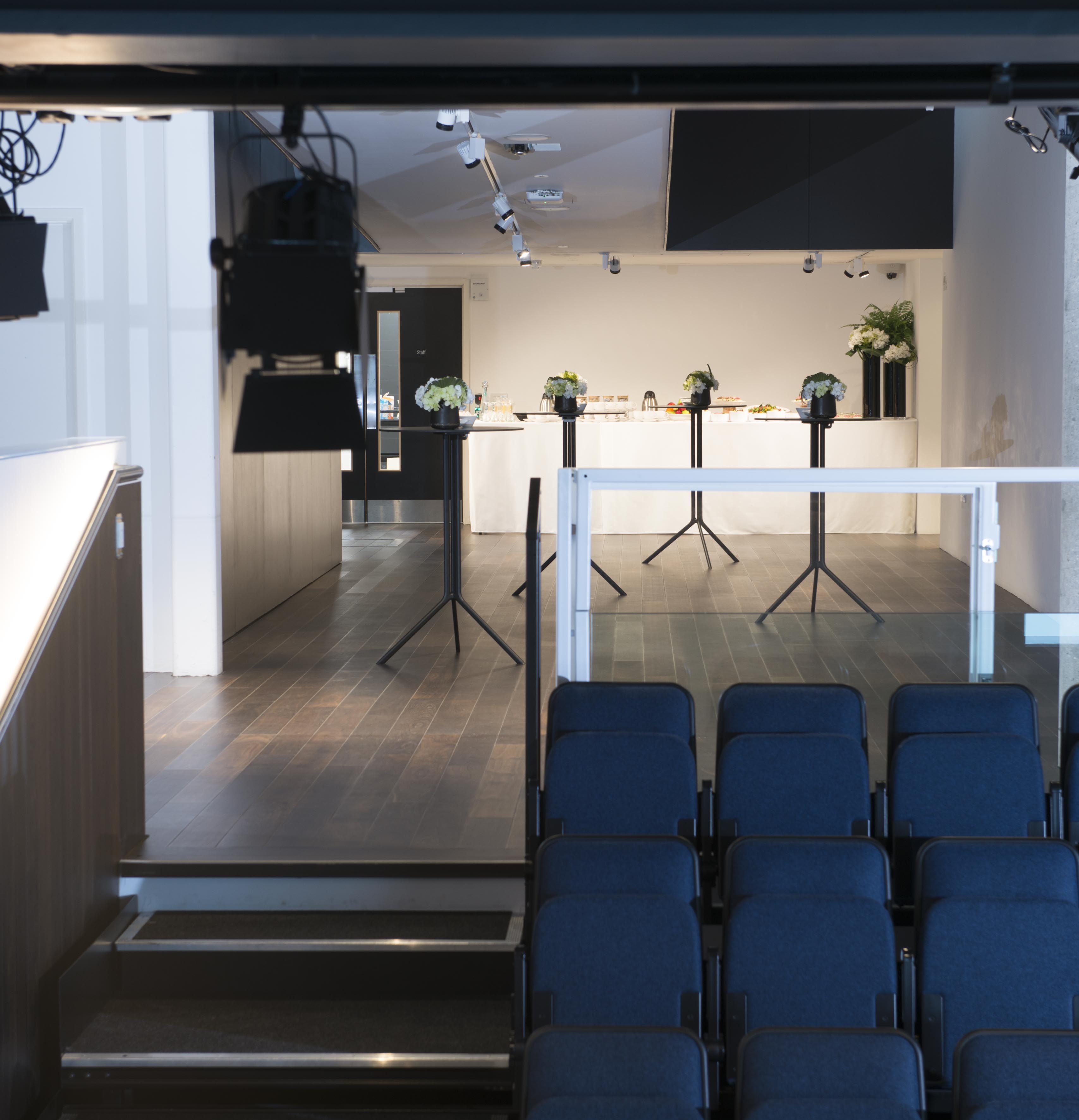 Modern event space in Science Gallery London, featuring minimalist design and seating for presentations.