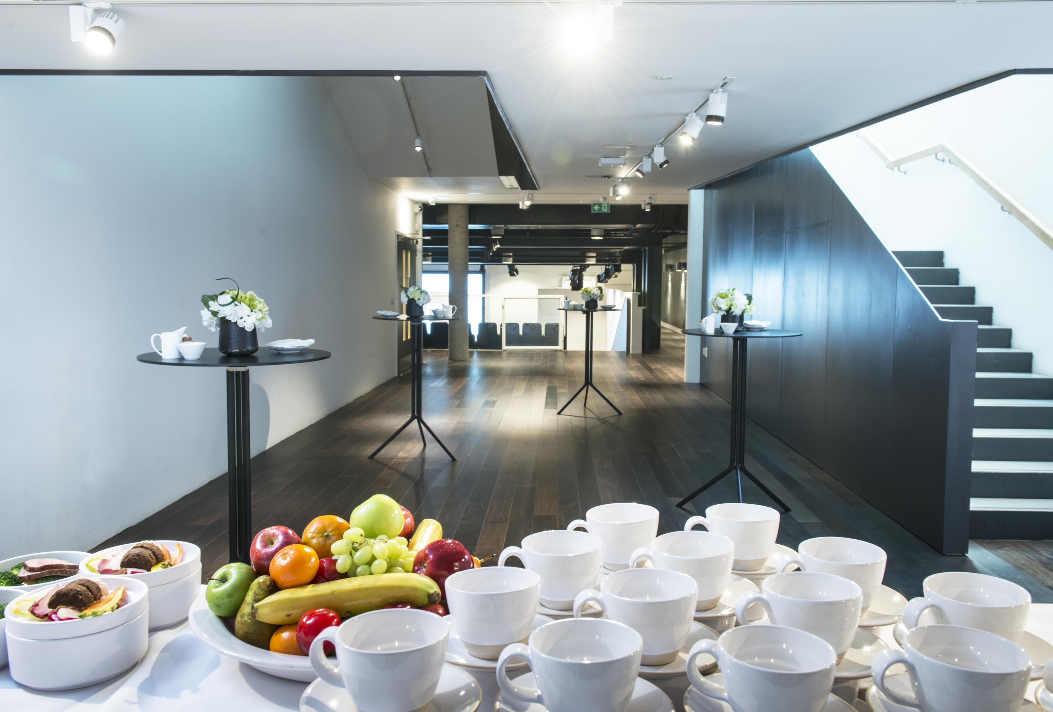Modern event space in Science Gallery London with refreshment station for networking events.