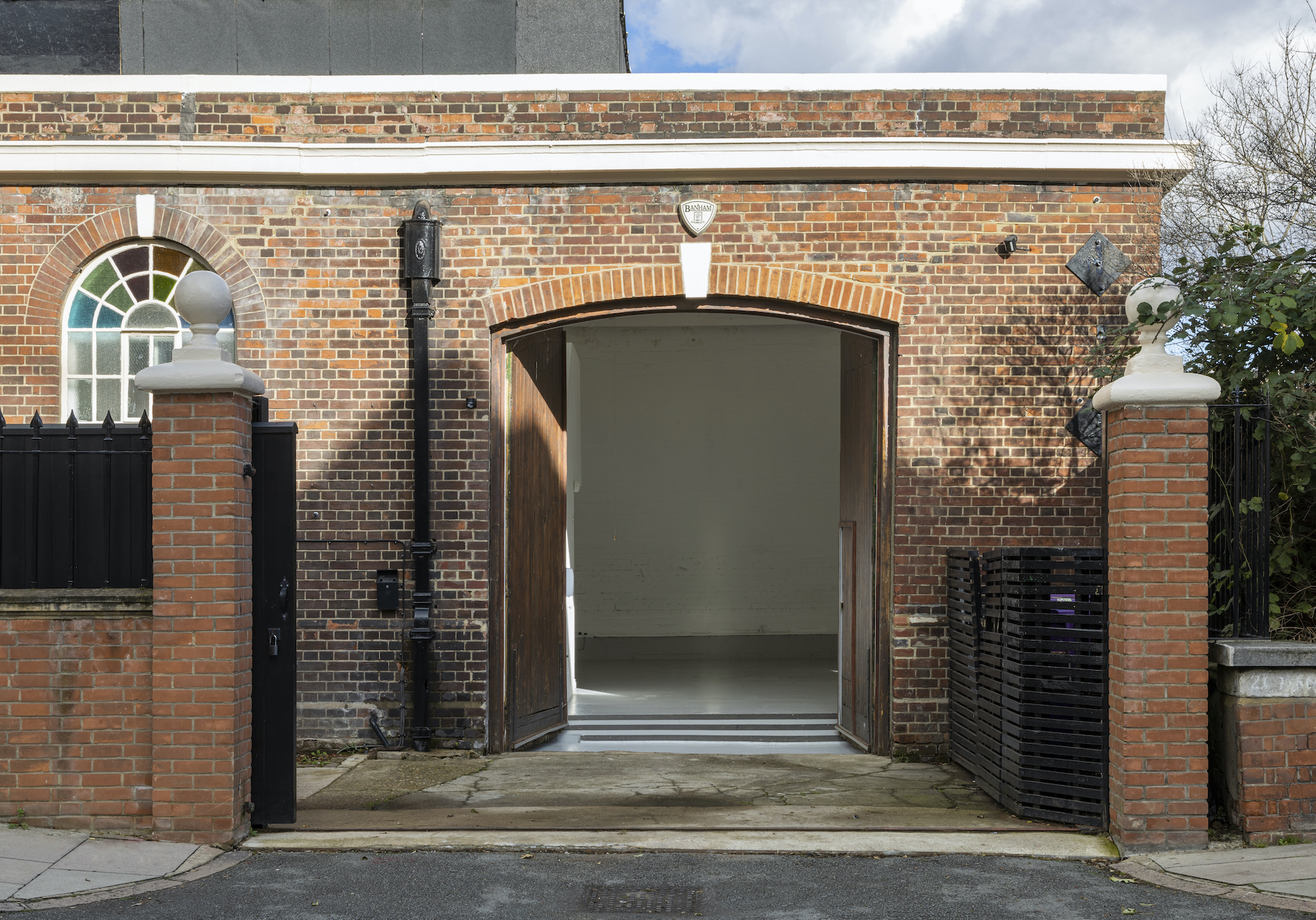 Versatile venue entrance at The Stalls, Park Village for corporate and social events.