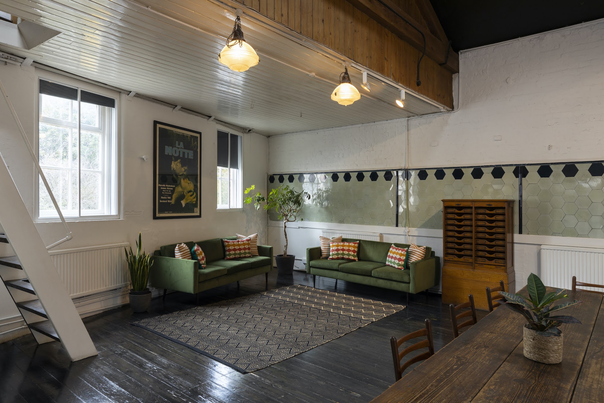 Versatile meeting space at The Stables, Park Village, ideal for events and collaboration.