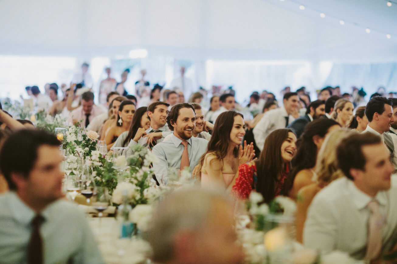 Garden Pavilion event in Chiswick House, featuring floral decor and engaged audience.