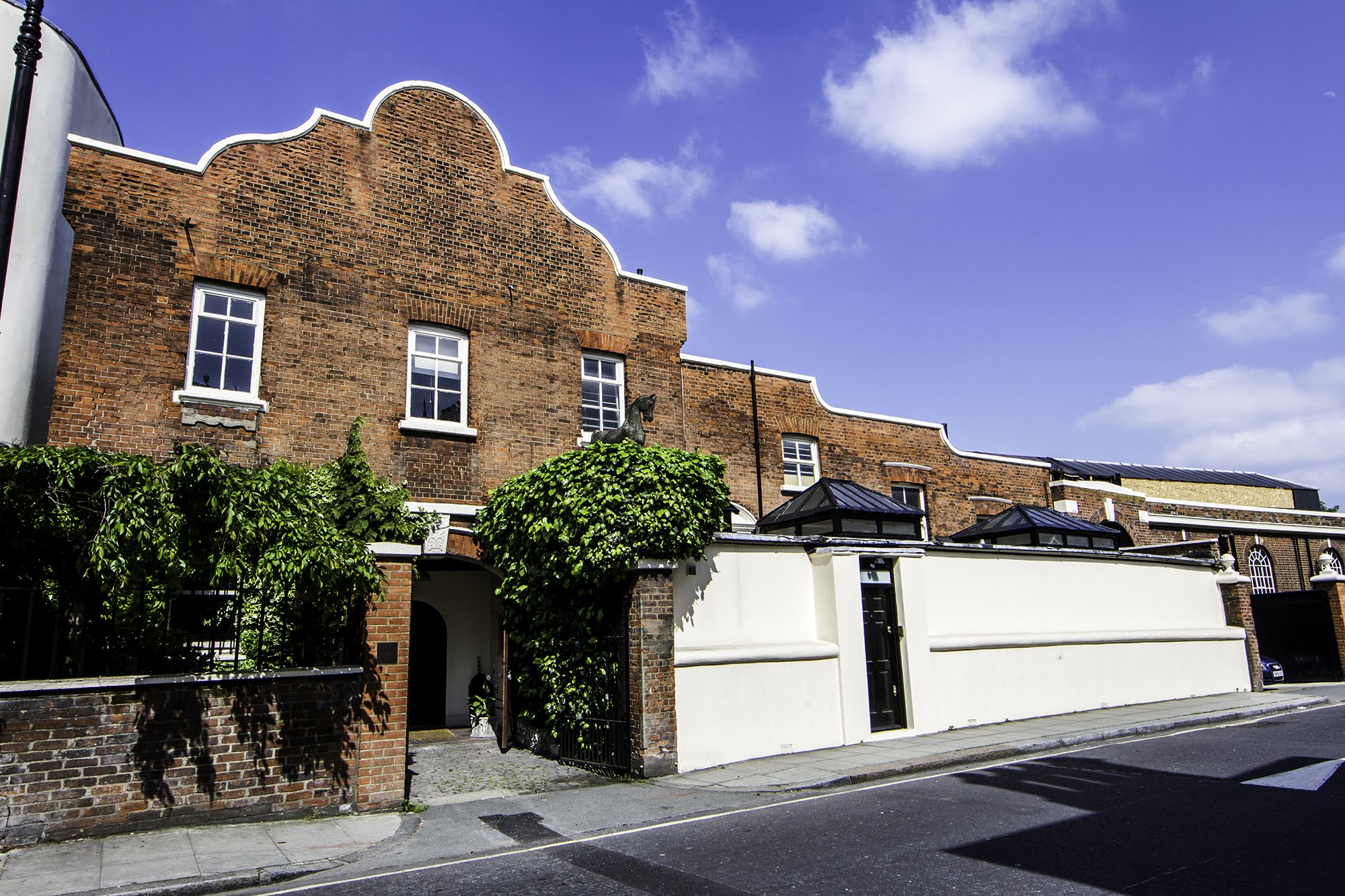 Charming Park Village venue with brick facade, ideal for corporate and social events.