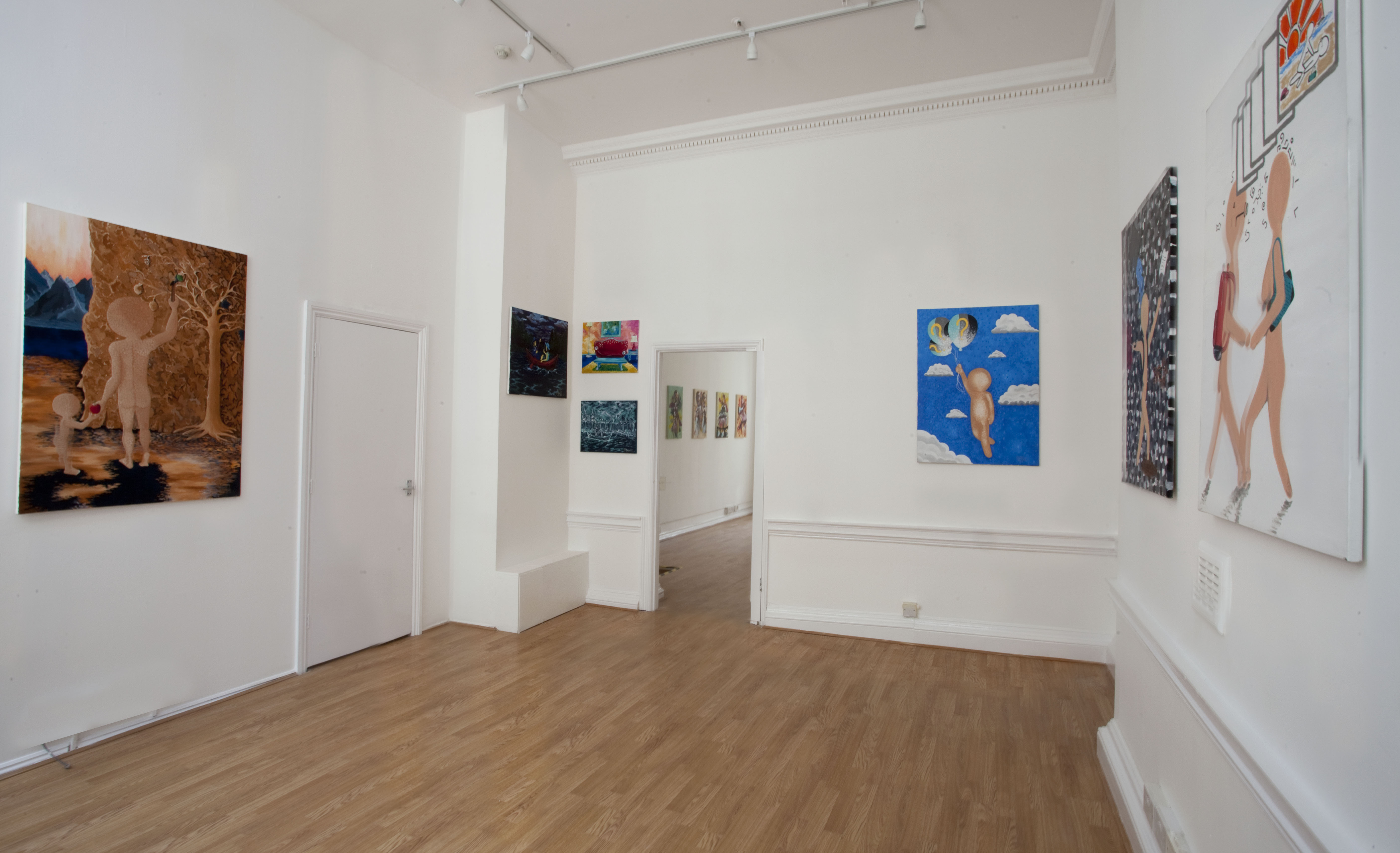 Spacious Zari Gallery with white walls, ideal for art exhibitions and receptions.