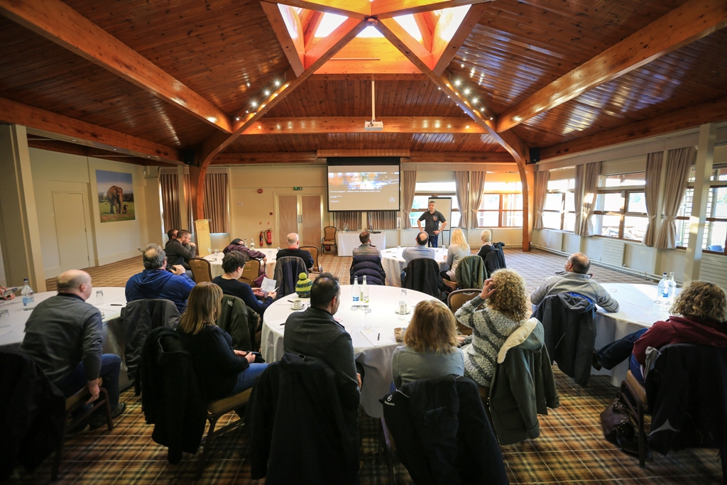 Meeting space at Woburn Safari Lodge with wooden beams, ideal for conferences and presentations.