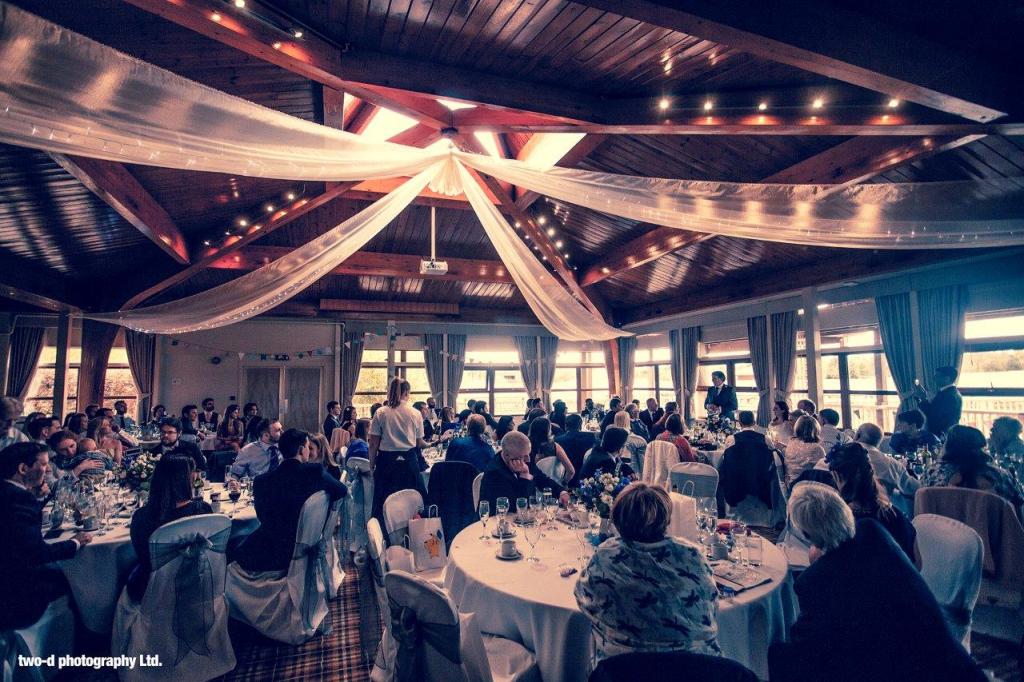 Elegant event space at Woburn Safari Lodge with fine dining setup for celebrations.