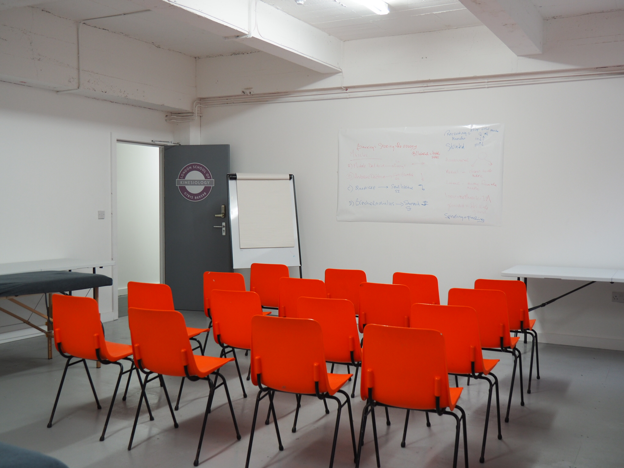 Whole Venue at Wick Lane Studio with vibrant orange chairs for workshops and meetings.
