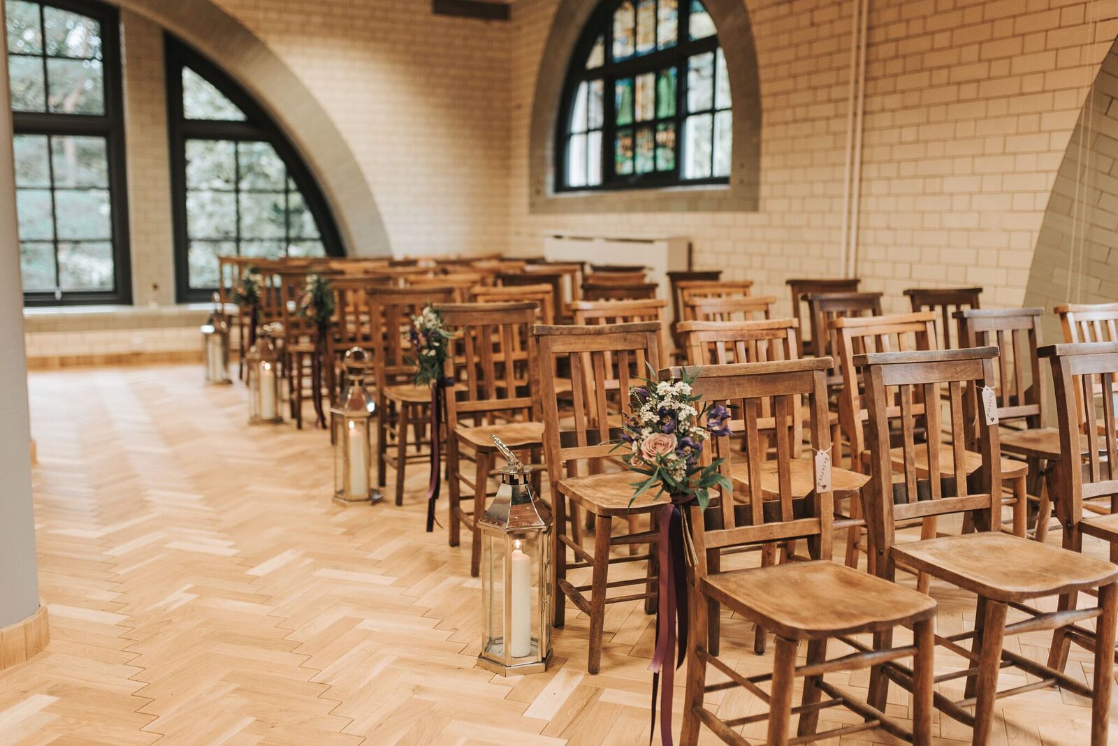 Ollerton Room event space with wooden chairs, ideal for ceremonies and gatherings.