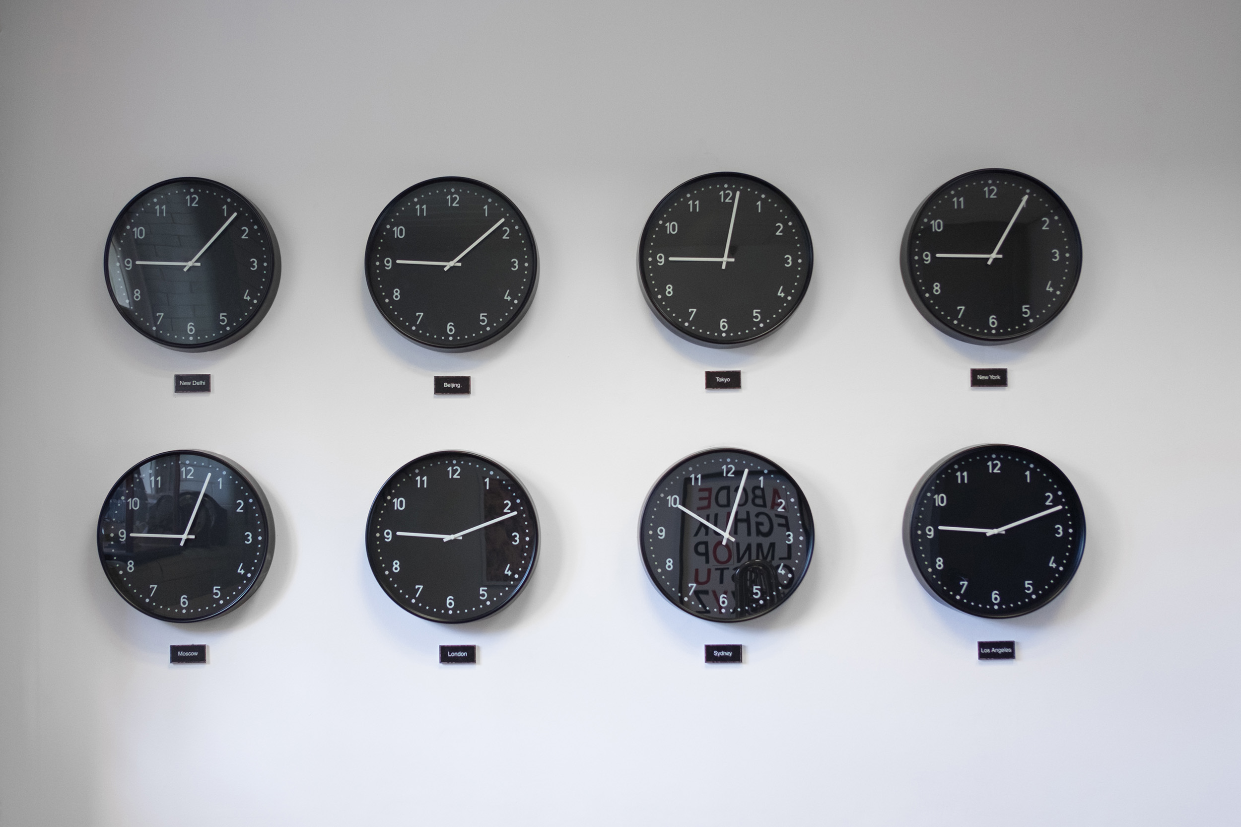 Themed meeting room with eight clocks for international event coordination.