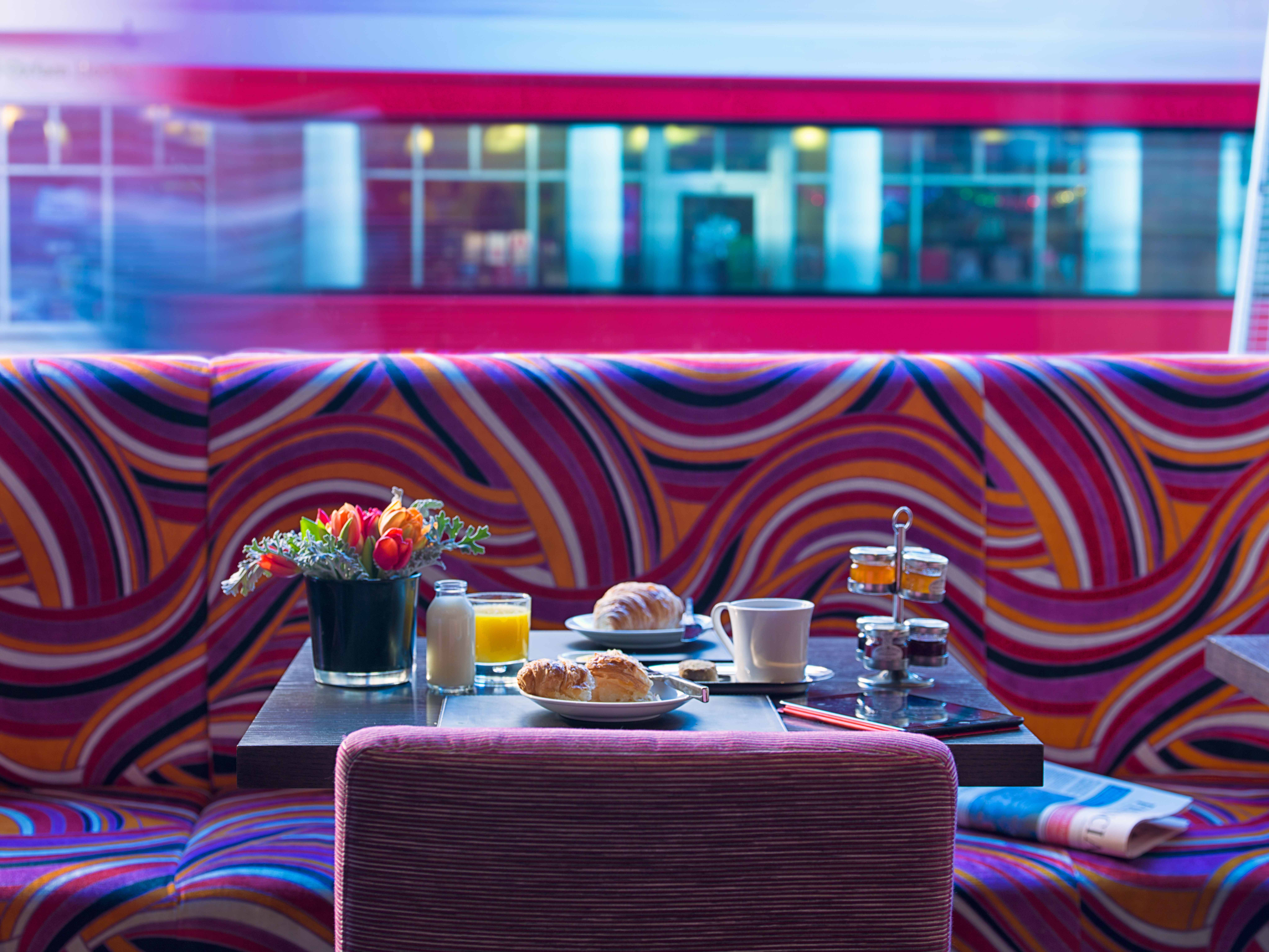 Vibrant meeting space at Radisson Blu Hotel, perfect for casual breakfast networking events.