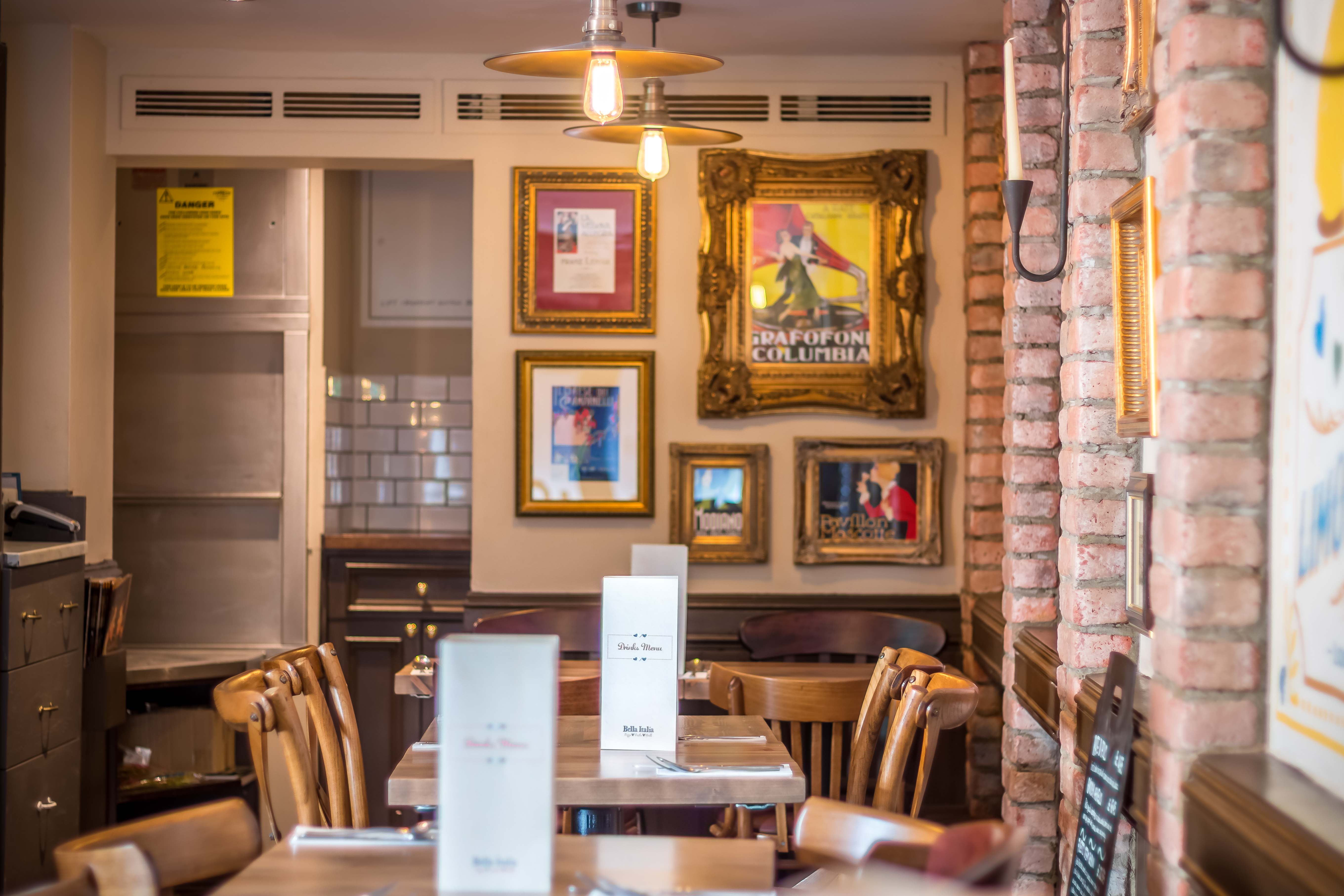 Cozy dining space at Bella Italia South Kensington, ideal for networking events and team lunches.