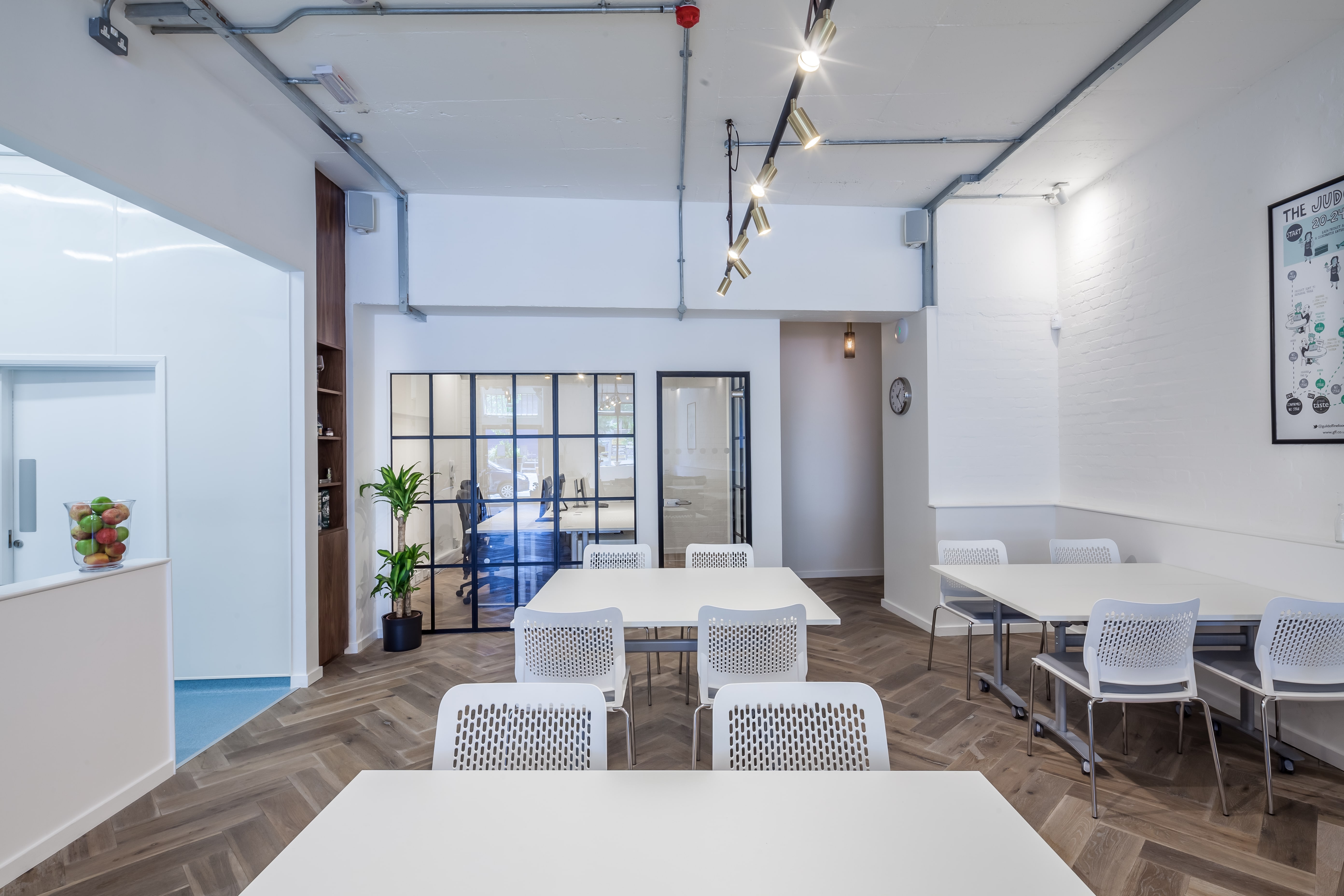 Modern meeting space with natural light for workshops and team meetings at Guild of Fine Food.