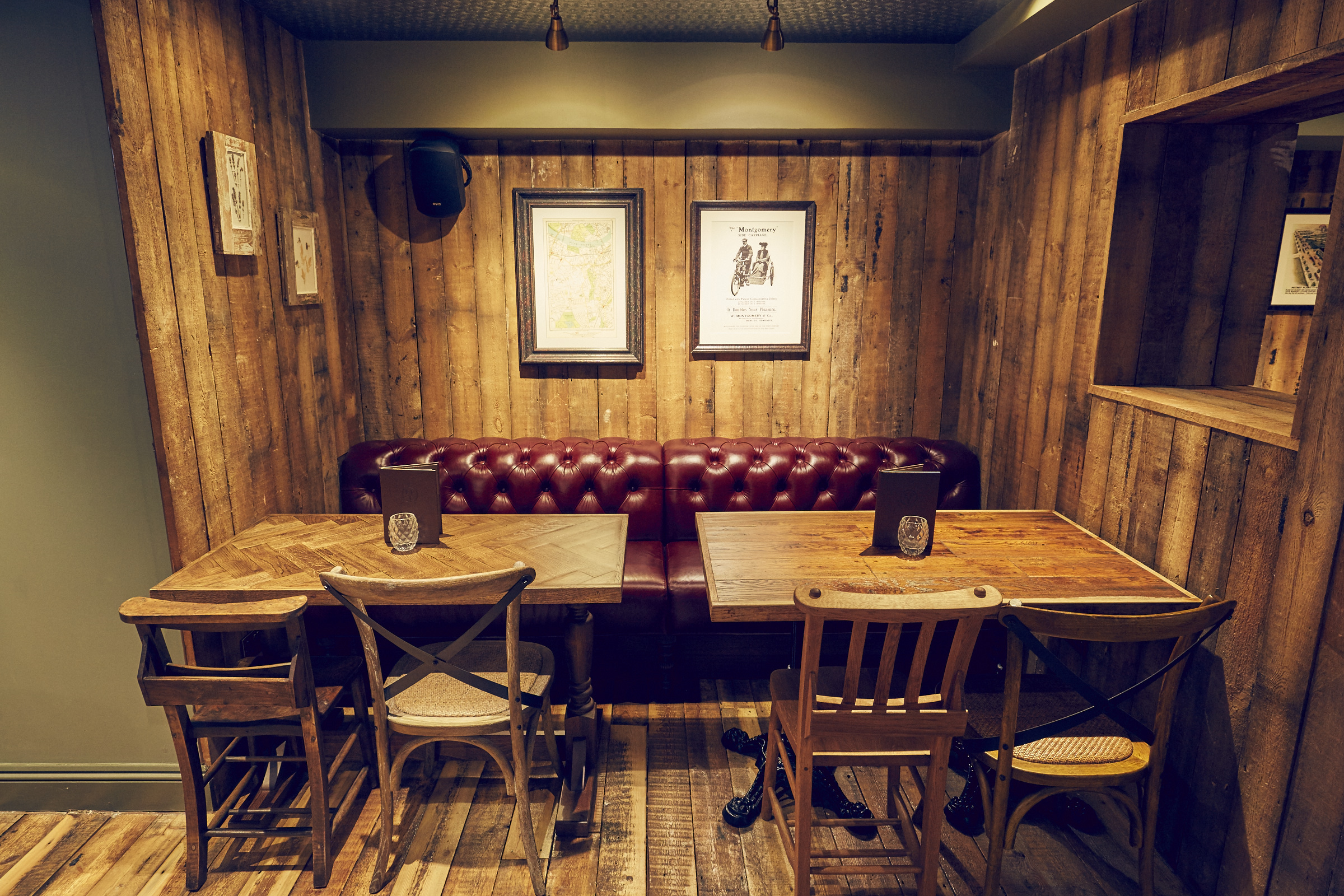 Cozy meeting space in East Putney Tavern with rustic decor for casual gatherings.