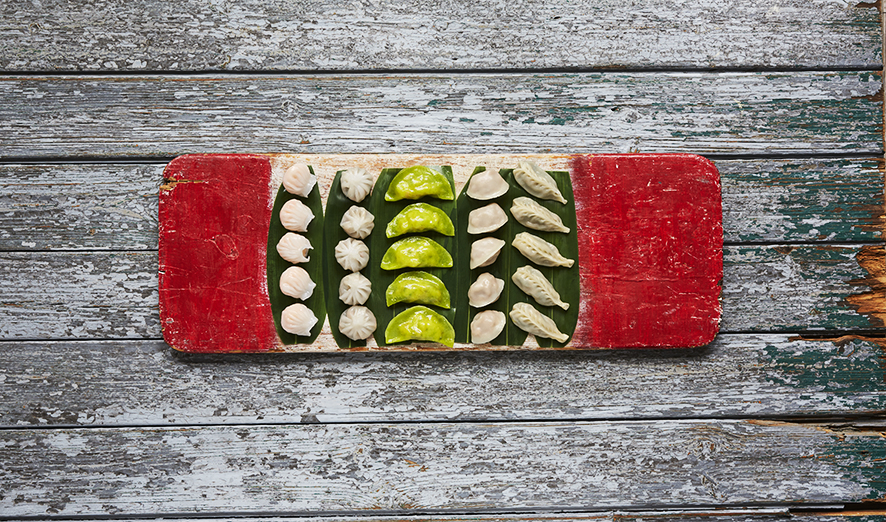 Dumplings and pastries display at Upstairs Lounge Exclusive, perfect for events and buffets.